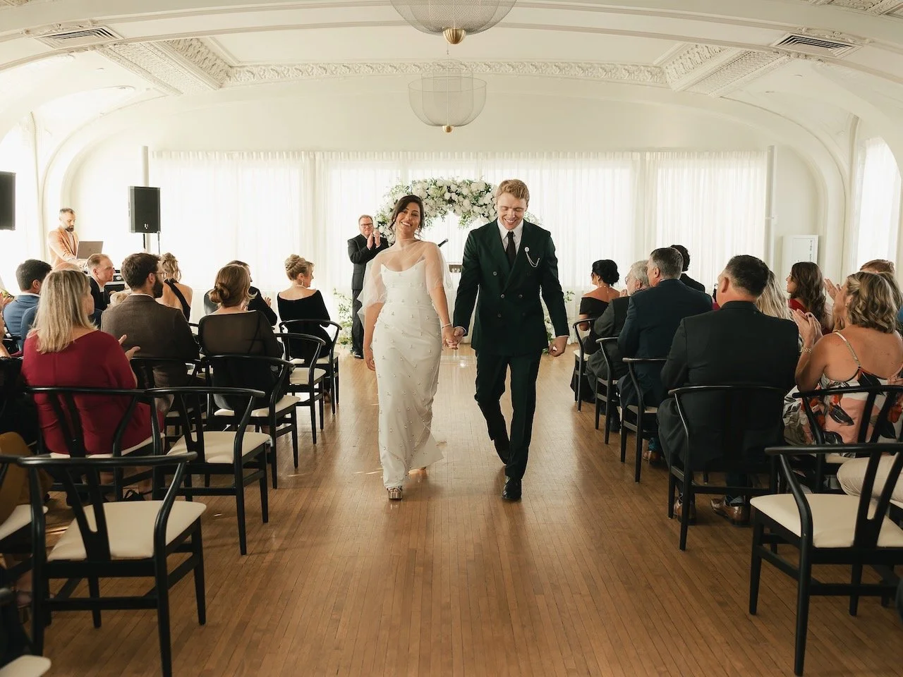 Wedding ceremony in the Schimmel Ballroom at the Kimpton Cottonwood Hotel, Omaha, DJ set up in the corner