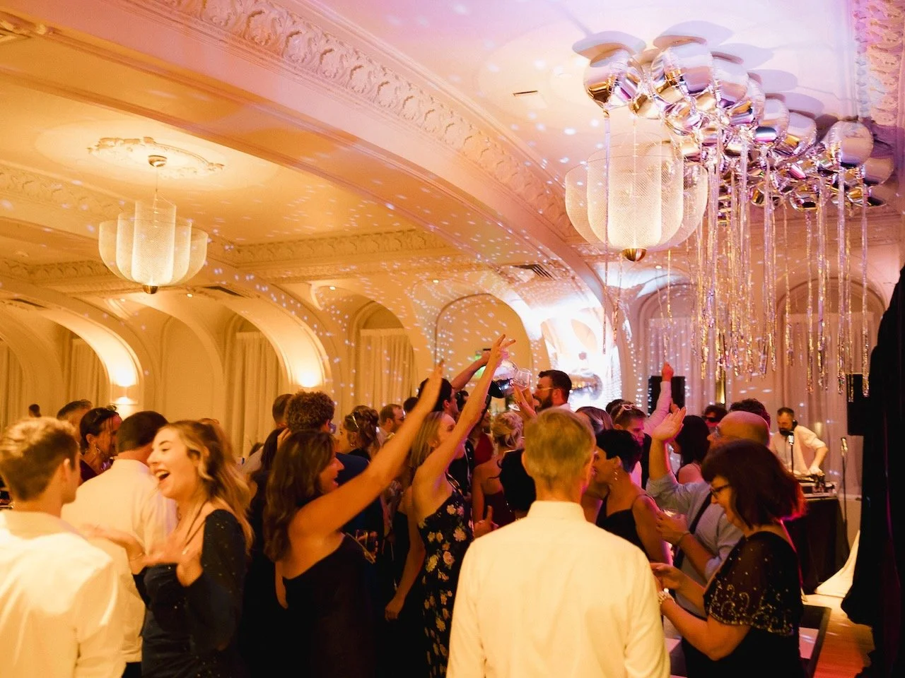 Packed wedding dance floor in the Schimmel Ballroom at the Kimpton Cottonwood Hotel, Omaha