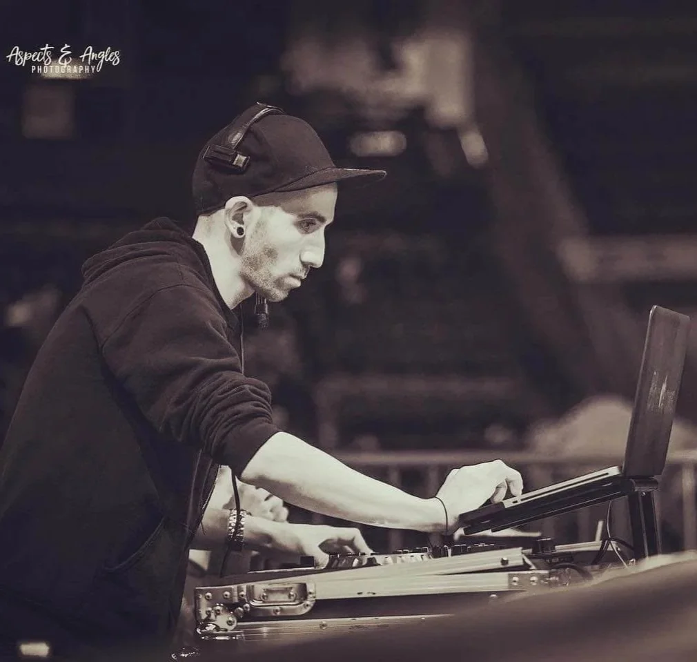 DJ Matt Corleone mixing at a corporate event