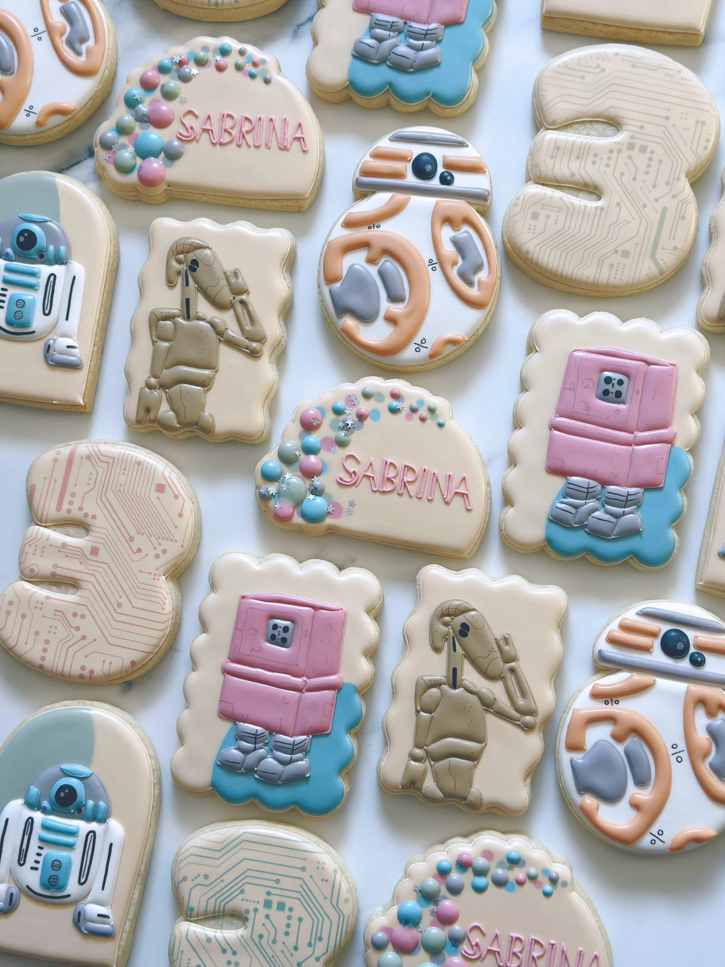 Star Wars droid birthday party! 🤖🪐

#starwarscookies #starwarsdroidcookies #birthdaycookies #sugarcookies #decoratedcookies