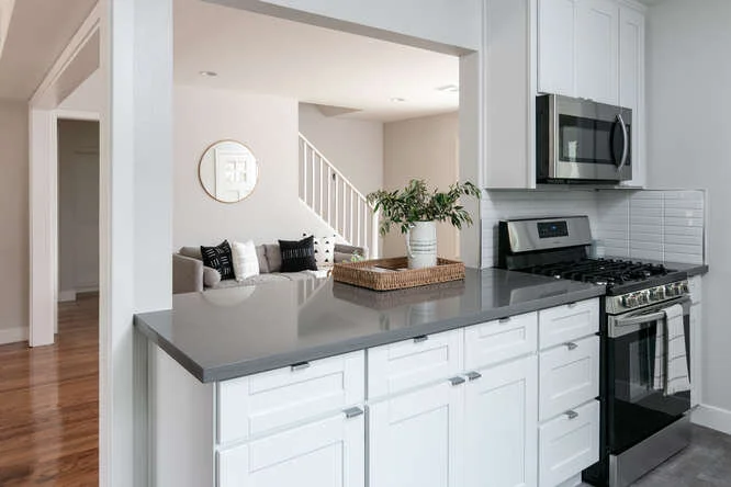 Transitional Kitchen Remodel by Coastline Construction Company project photo