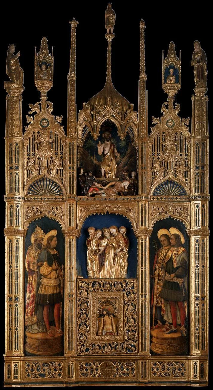Fifteenth-century Venetian polyptych by Antonio Vivarini and Giovanni d’Alemagna, with painted saints arranged in multiple tiers within an elaborate carved and gilded Gothic frame.