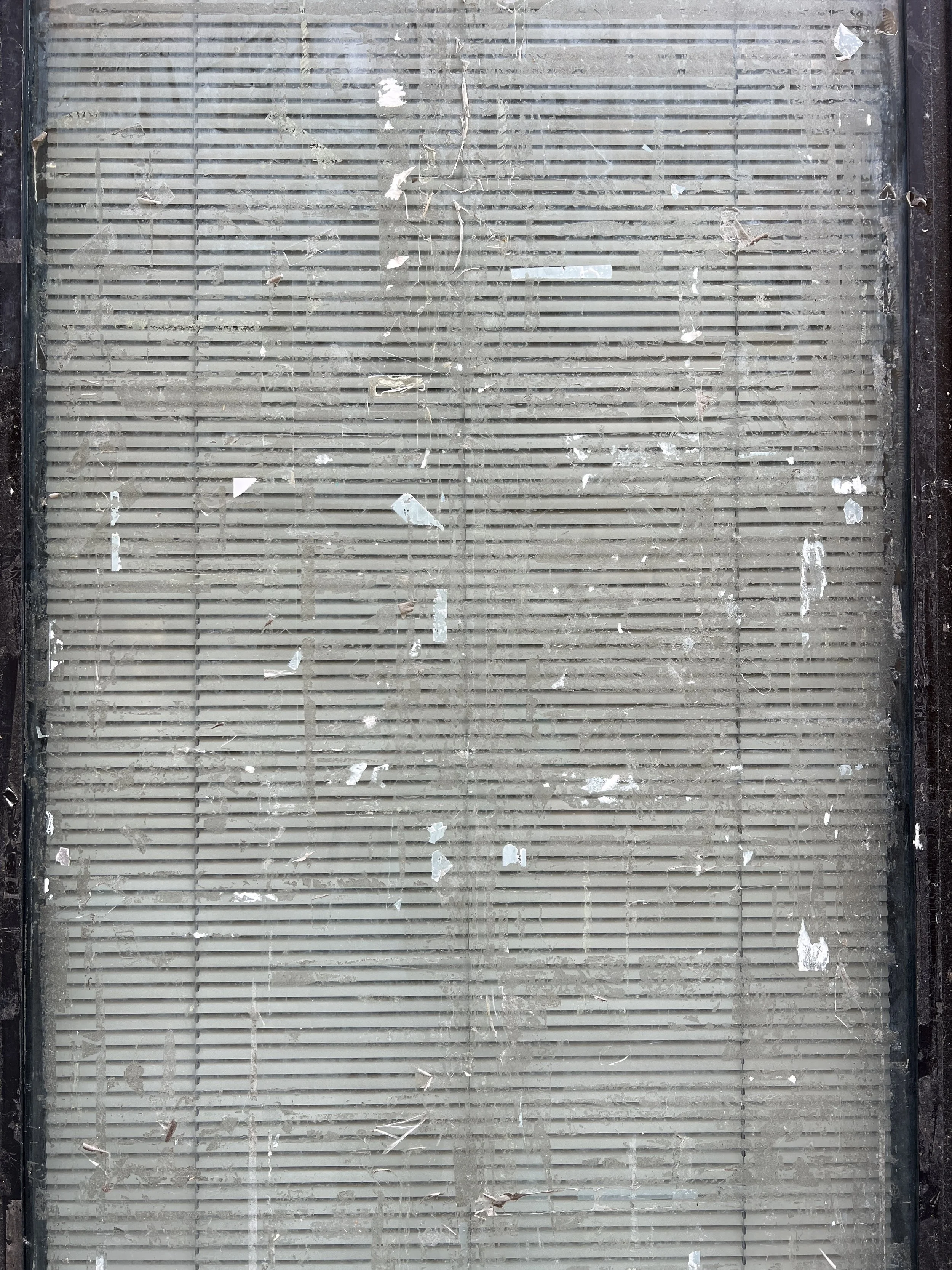 The last time I was in Vallauris, the town was failing. Most of the storefronts were closed. I loved what I saw on the windows, these bits of paper from fliers that had once been pasted there. Makes me think of Agnes Martin.