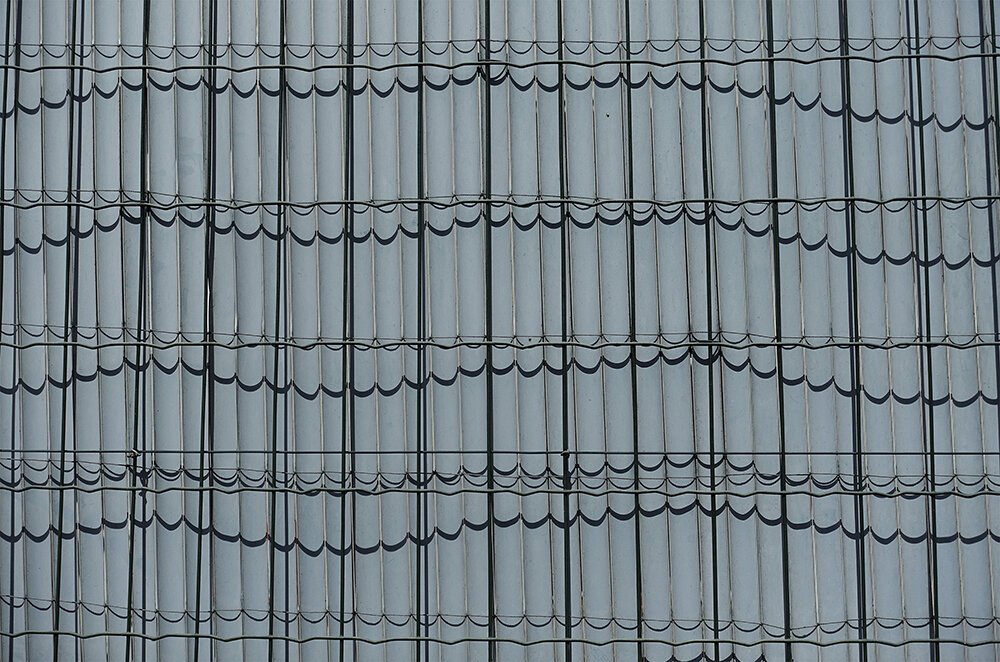 "Green Fence," 22.5 inches x 34 inches, archival inkjet print on paper, © 2017 Leslie Parke