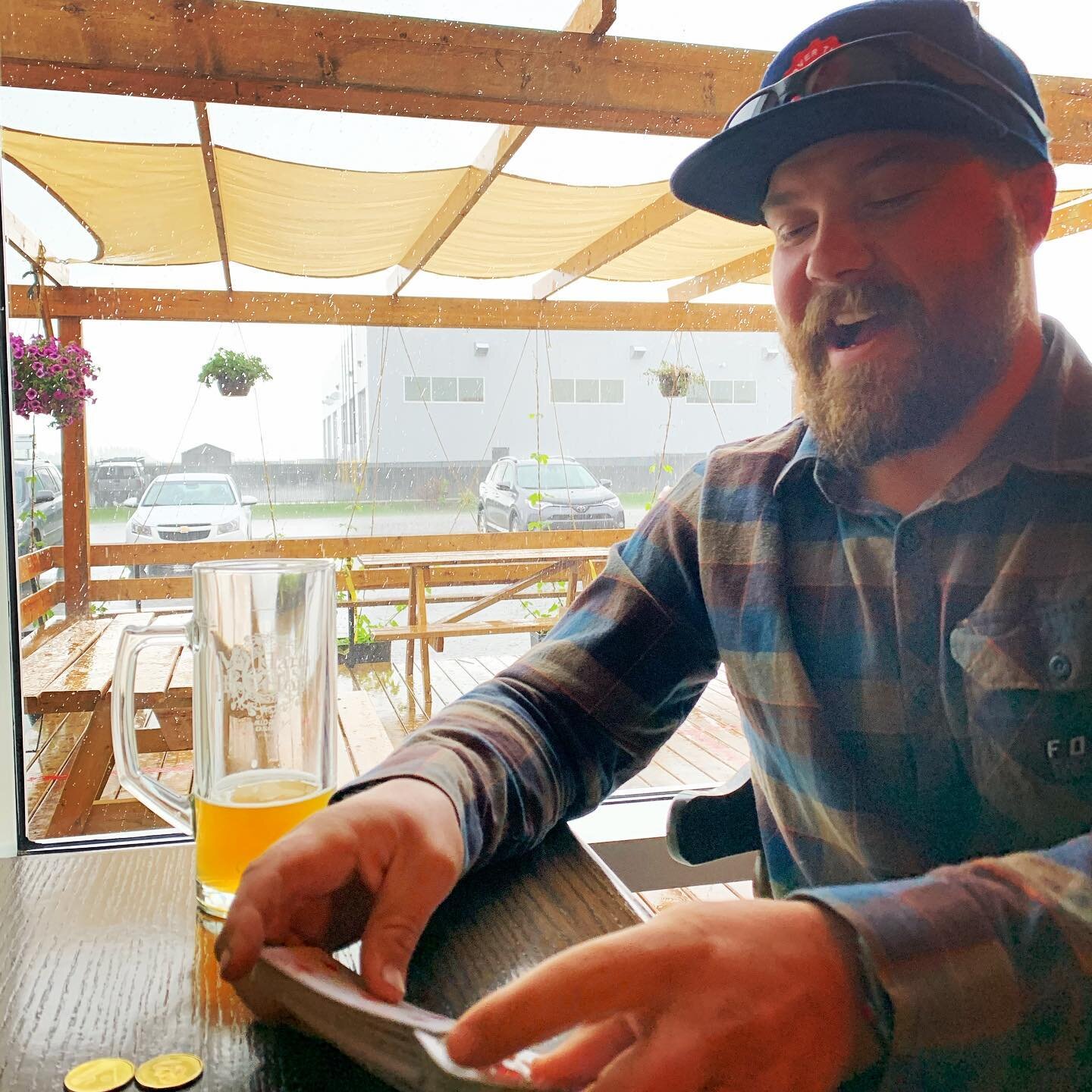 @redhartbrewing caught in the rain. No place we&rsquo;d rather be.  With beautiful Hard Hels Hops in the background patio views.
.
.
.
#supportlocal #reddeerbeer #hardhelshops #albertahops #albertacraftbeer