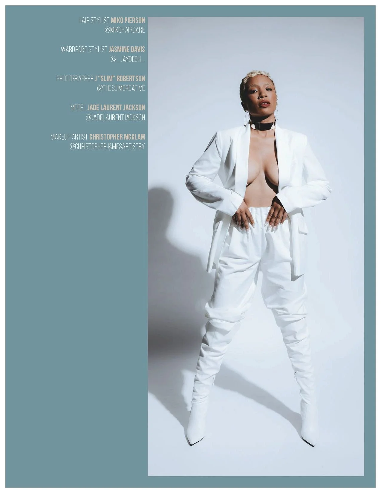 A fashion model posing in a white suit with an open blazer, revealing her bare chest, with white boots, on a plain light background. Text on the left credits team members involved in styling, photography, and makeup.