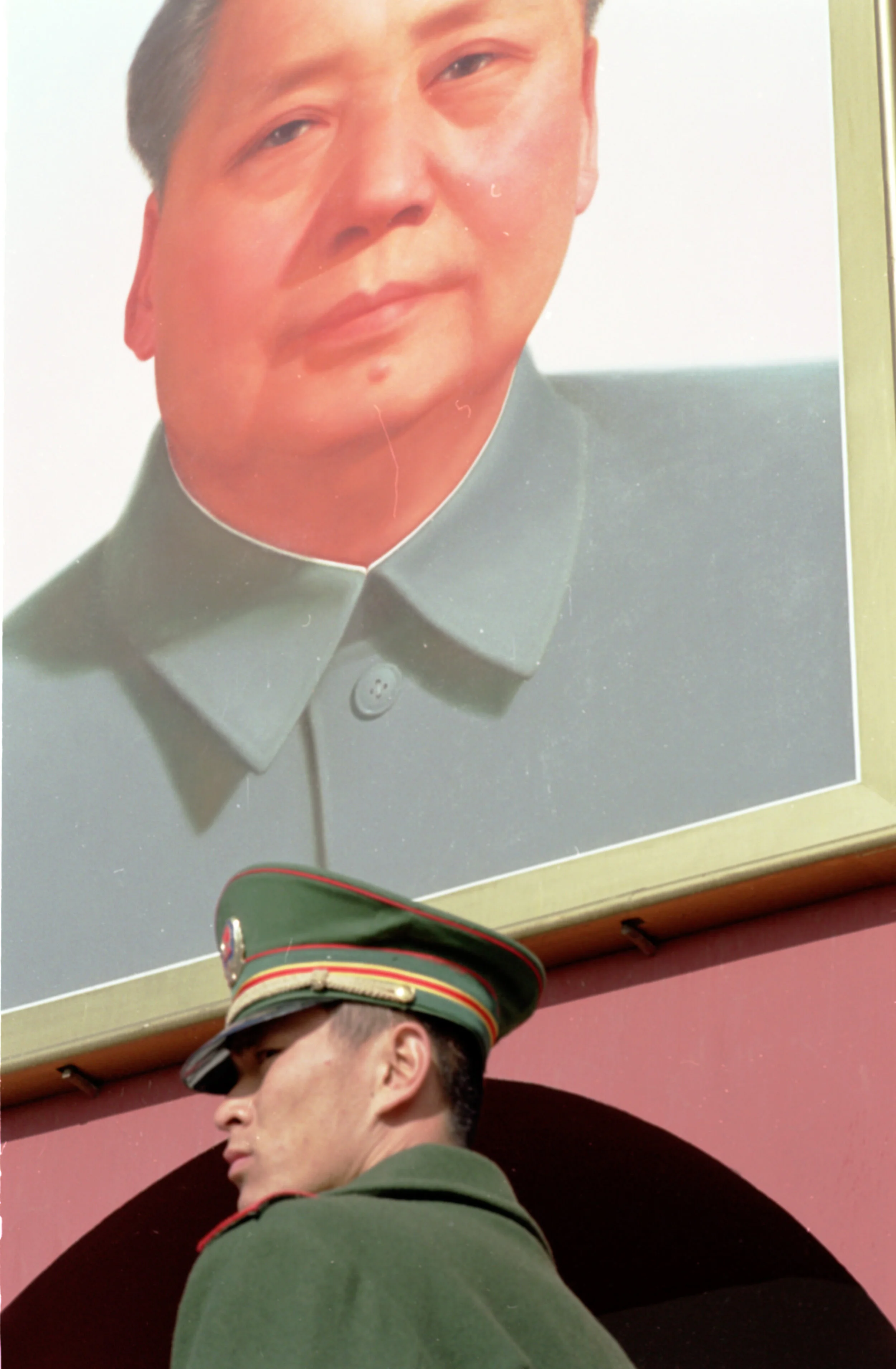 guarded mao.jpg