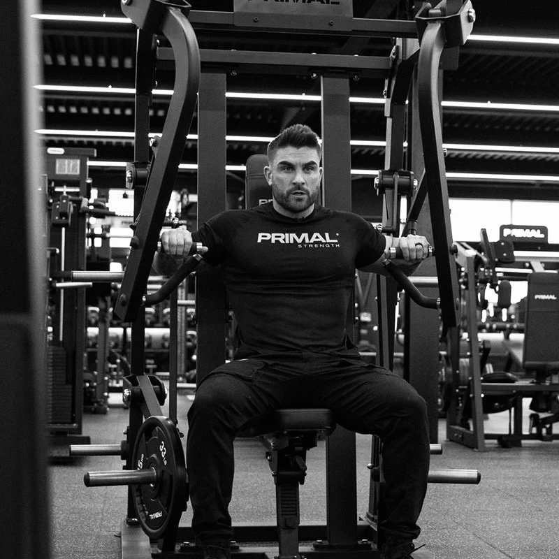 Why We Don’t Use Machines at Poseidon: The Case for Free Weights and Real Movement