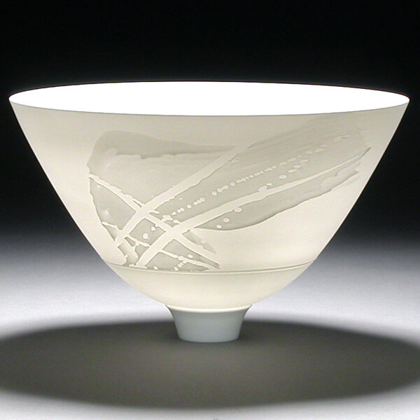 The transparency of the material is clearly visible due to the thin wall thickness. The vessel is by Arnold Annen.