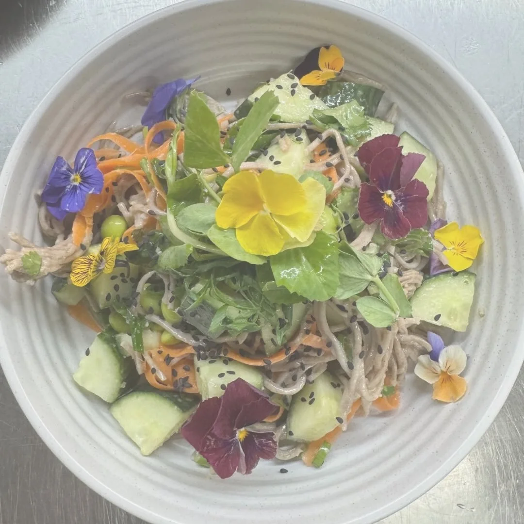 happy saturday to our amazing community! we are back open everyday! pop in and try our newest hit, soba noodle salad.