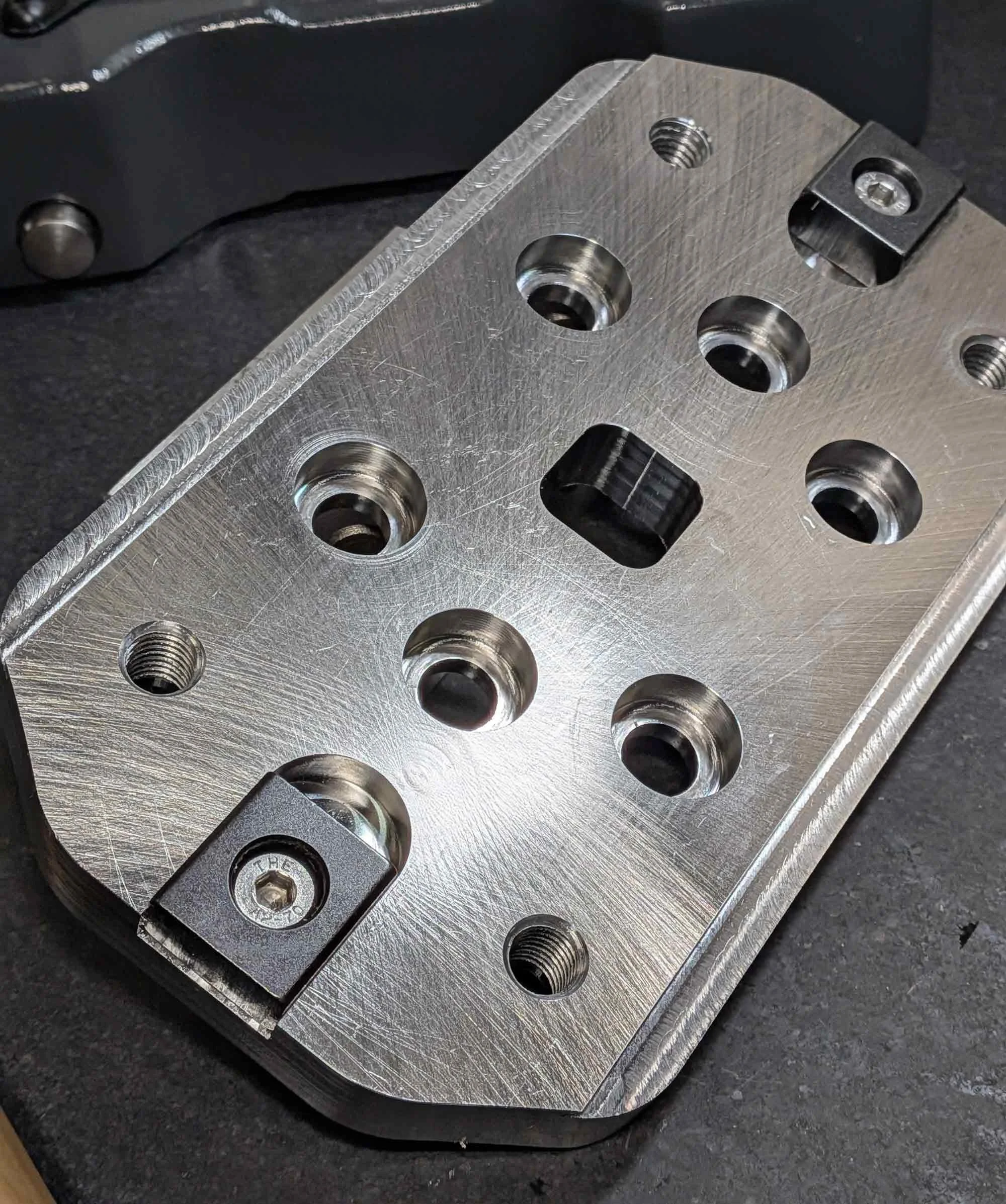 Custom adapter plate for Lang 45480 Quick Point grid plate to Tsudakoma TWA-160 rotary.  Made in 4140 steel.