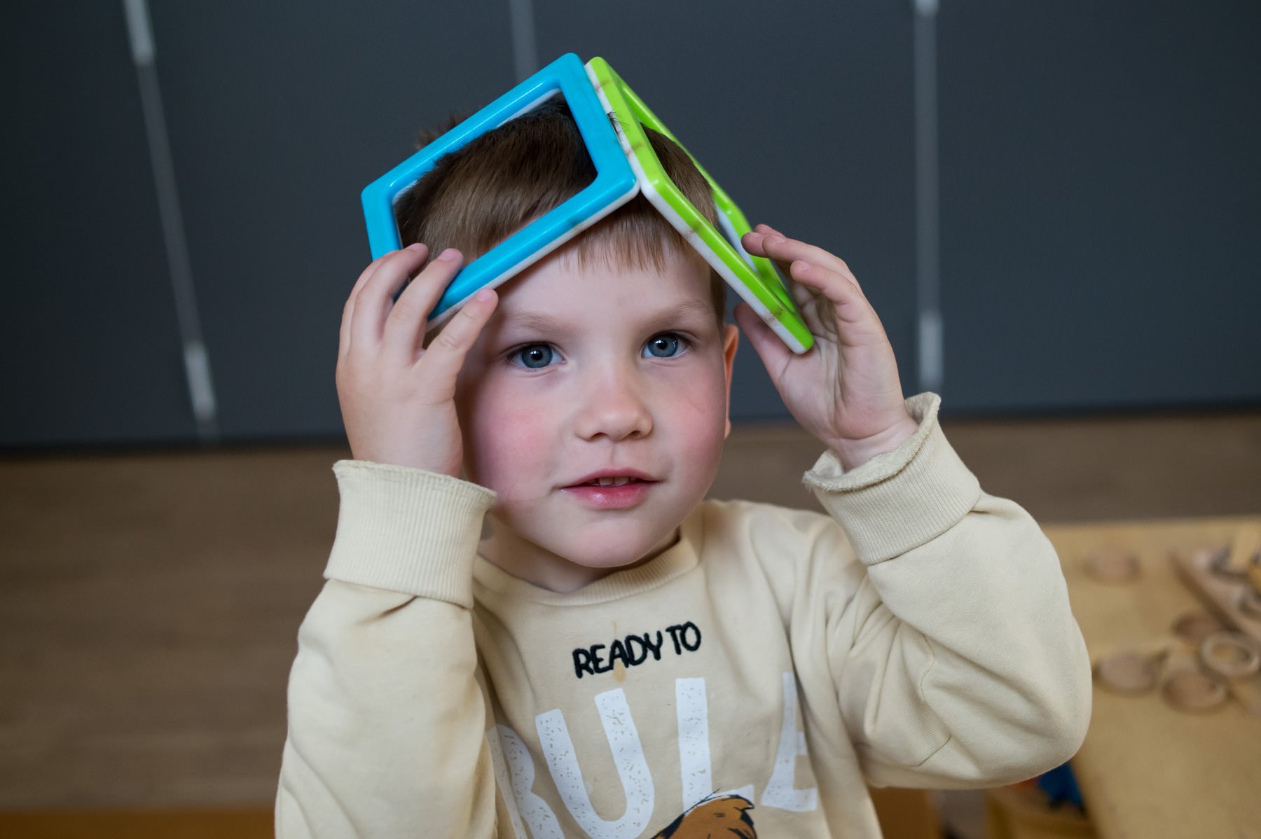 Child with preschool toy