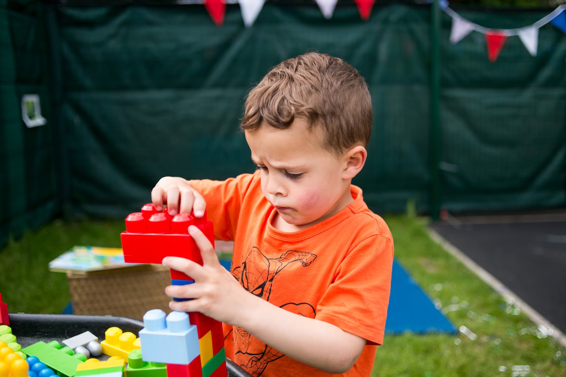 Child-at-nursery-Lego-station