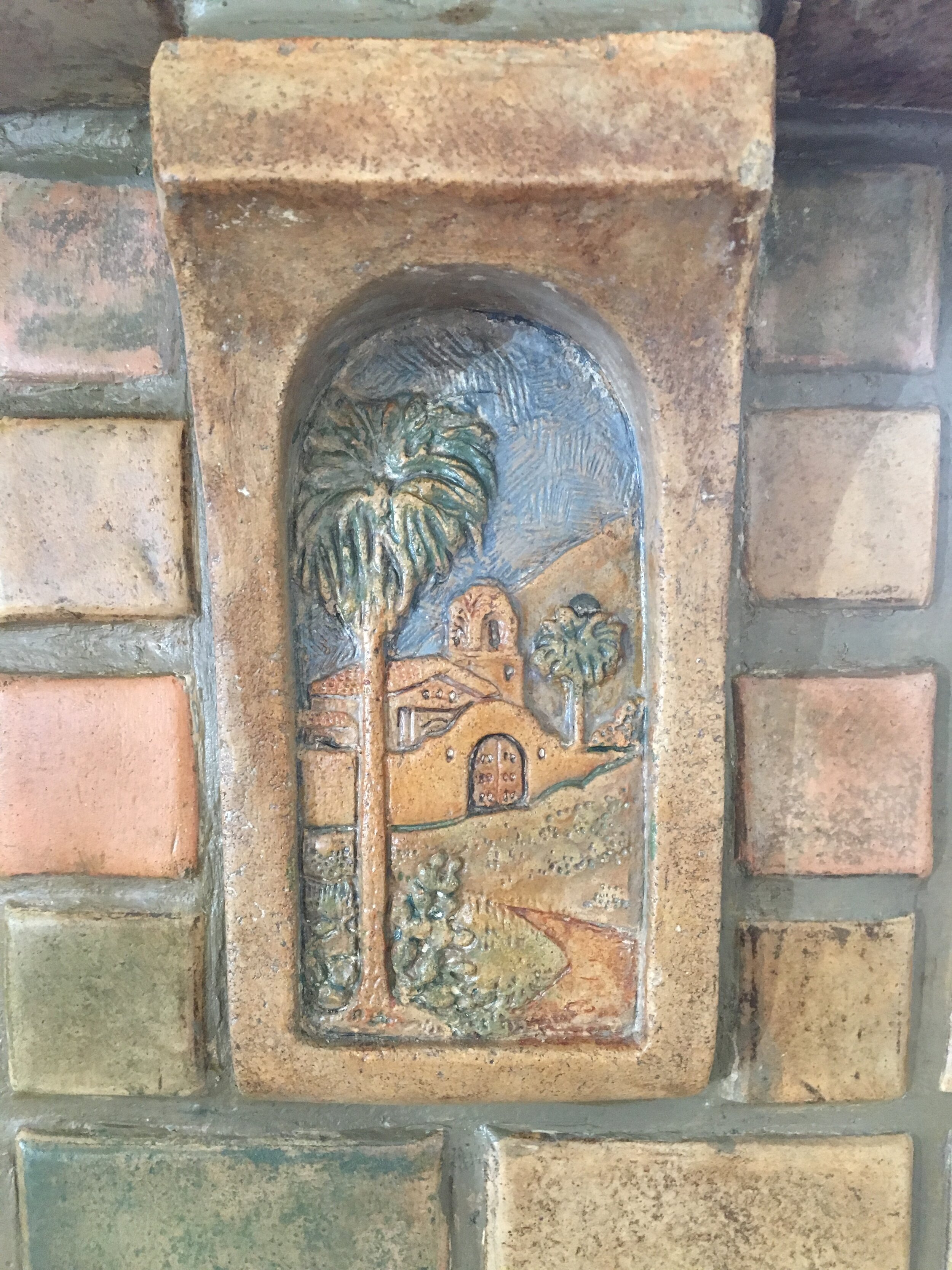 Claycraft tile and Batchelder fireplace stripped, restored, recolored, and sealed