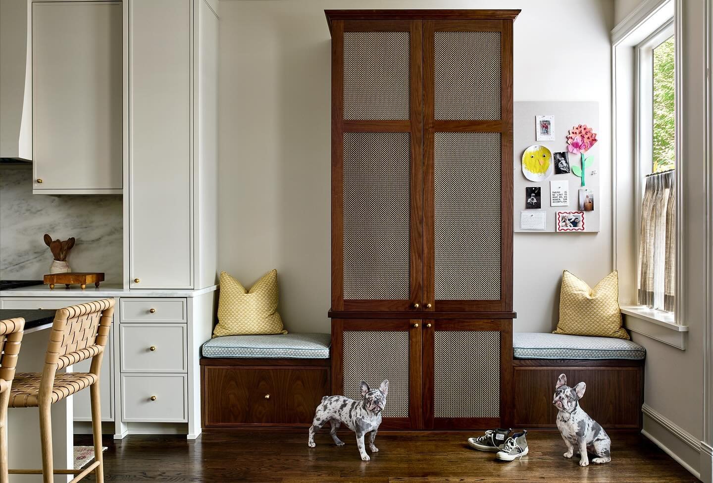 What to do when your home doesn&rsquo;t have a mudroom? Create one that blends in and stands out. A duo of decadent frenchies also helps 🤓 Swipe for the before. 
.
.
.
📷 @stacyzaringoldberg 
👷&zwj;♂️ @gardnerbuilt 
📐 @mortarandthatch 
🌸 @kincoll