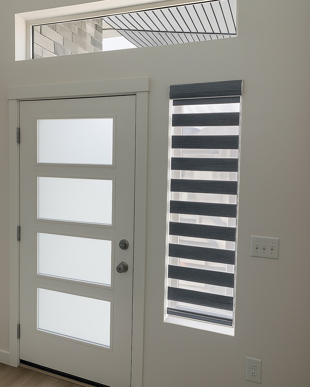 Open, closed, or somewhere in between&mdash; our banded shades paired with a frosted window give you the perfect blend of style and privacy for your front door or any window in your home&mdash;layered light control without sacrificing design💫
