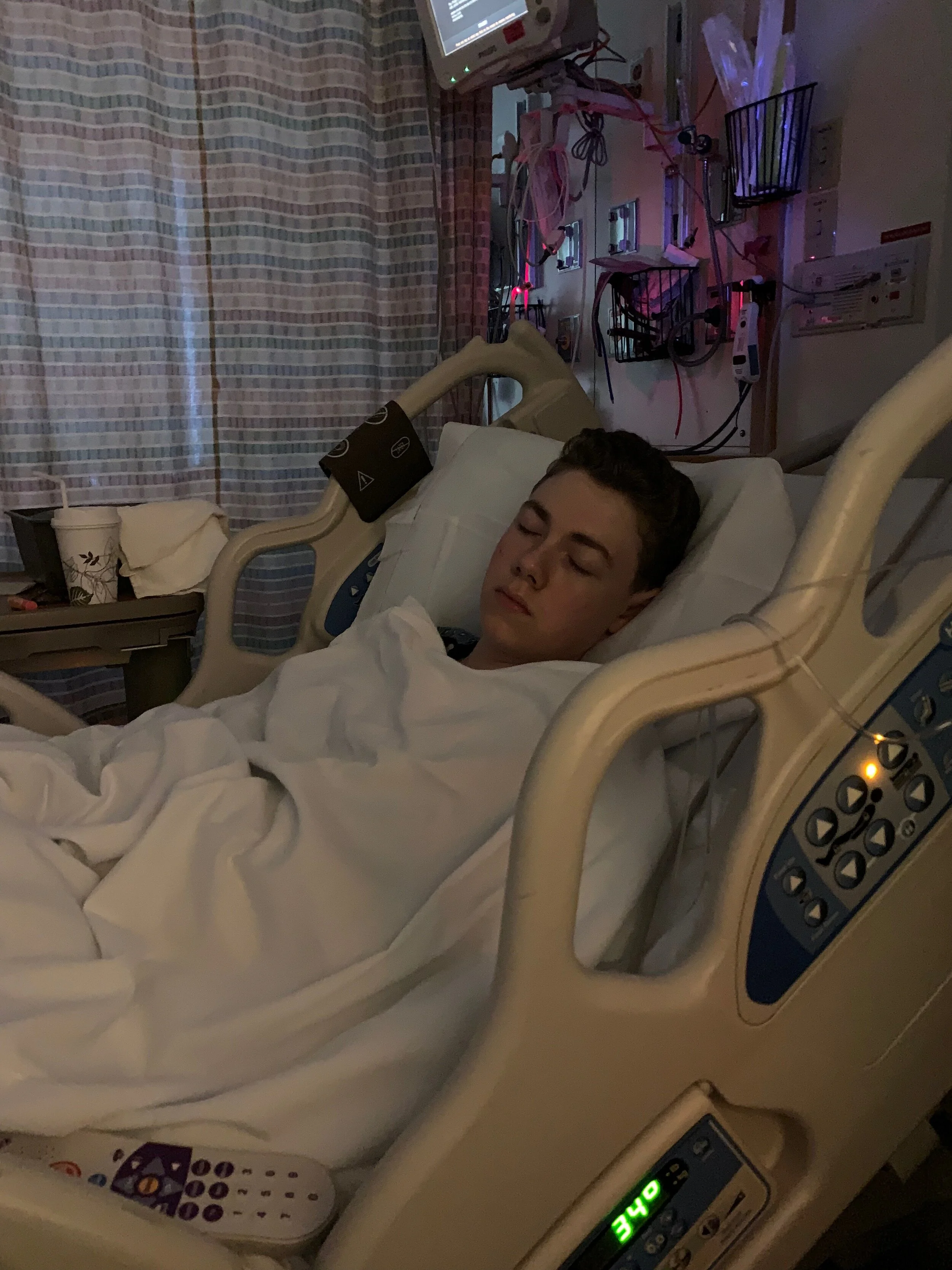 Resting in the hospital.