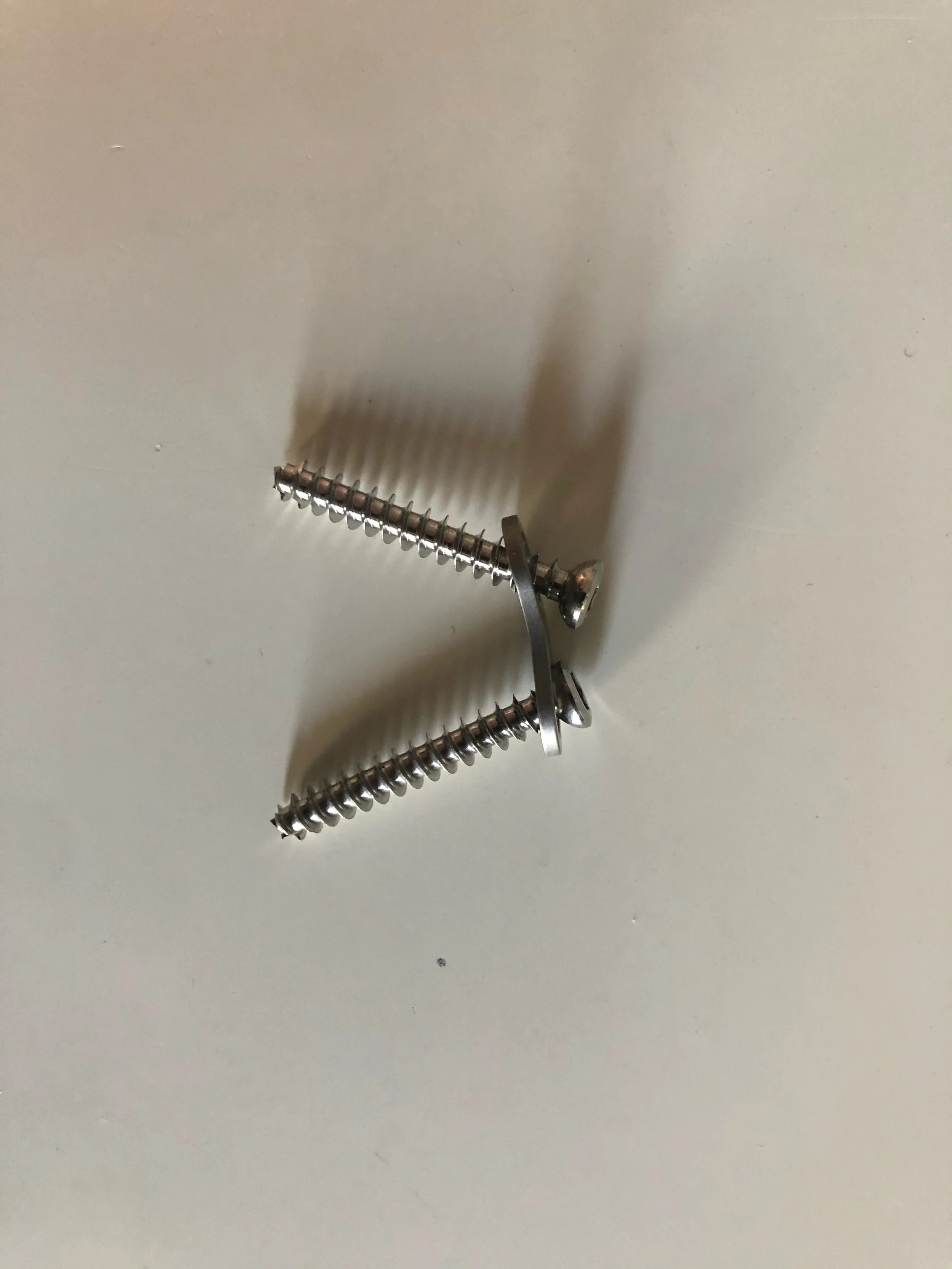 a picture of the 8-plate and screws