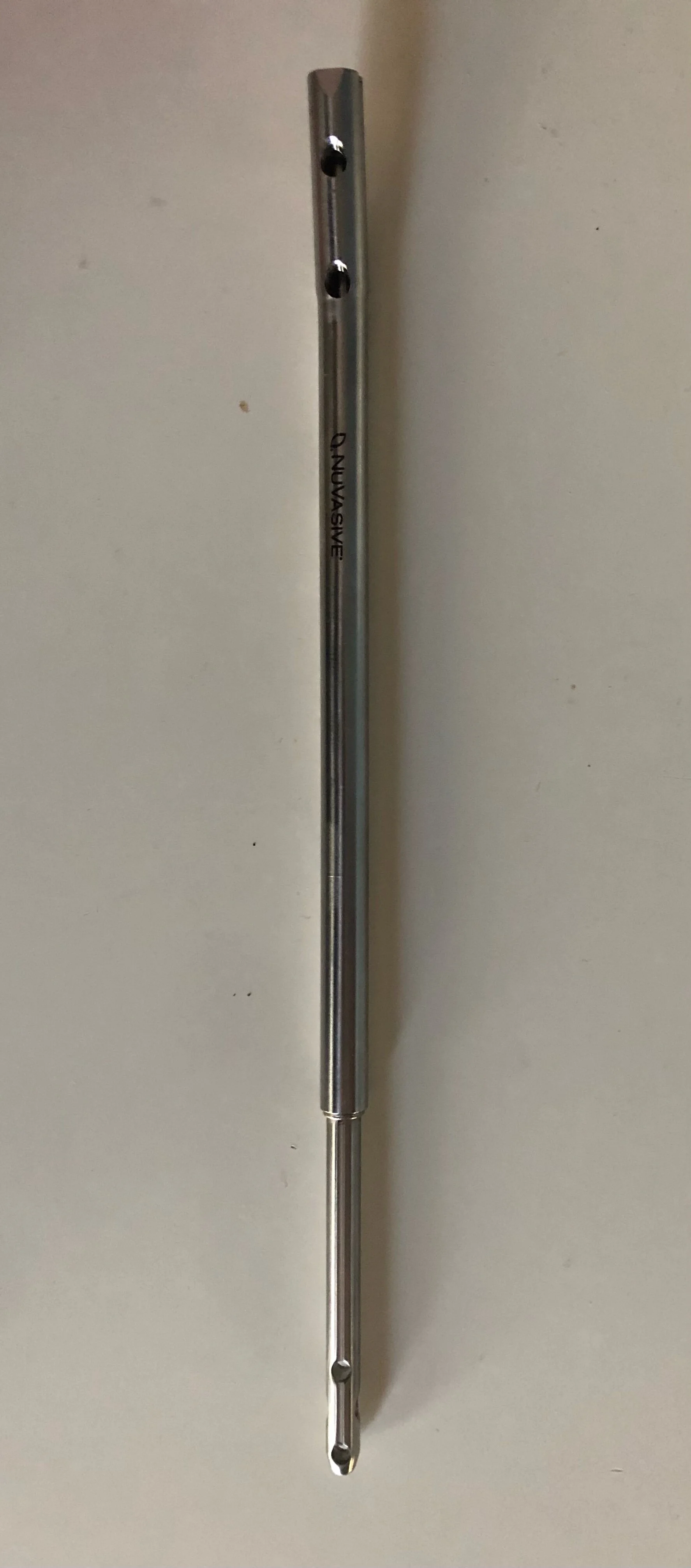 A side view of the nail. 