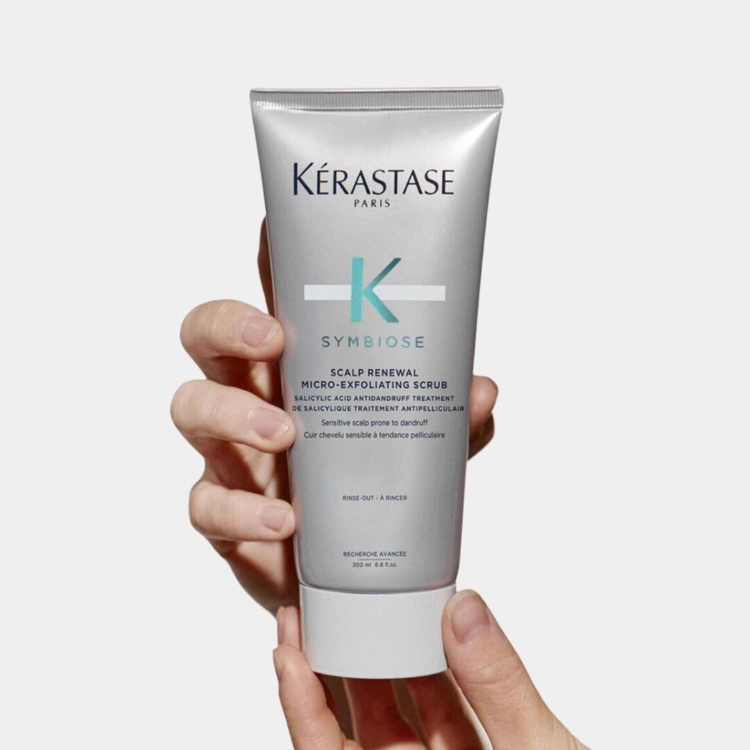 Purify and revitalize your scalp with Kerastase Symbiose SCALP RENEWAL EXFOLIATING ANTIDANDRUFF SCALP SCRUB. This award-winning scrub, honored with Cosmopolitan's 2023 Holy Grail Beauty Award for 'Best Scalp Scrub,' is your solution for a clearer, he