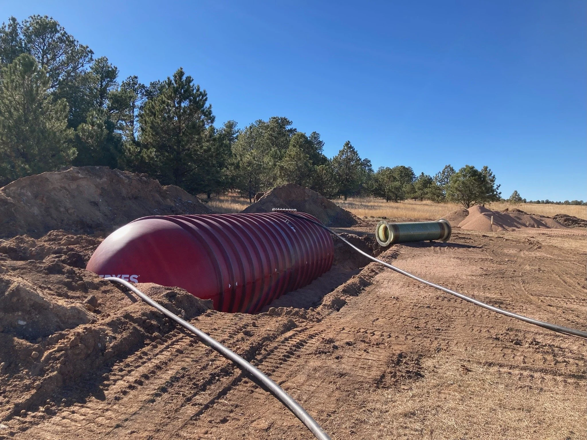 Installing the 10,000-gallon cistern.