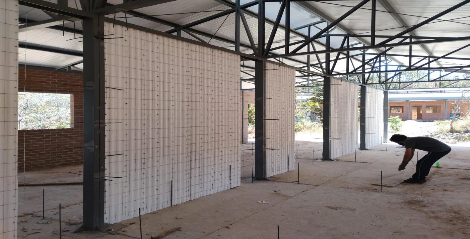 Interior partition walls in thermoacoustic EPS panel, dividing the rooms of one dormitory block.