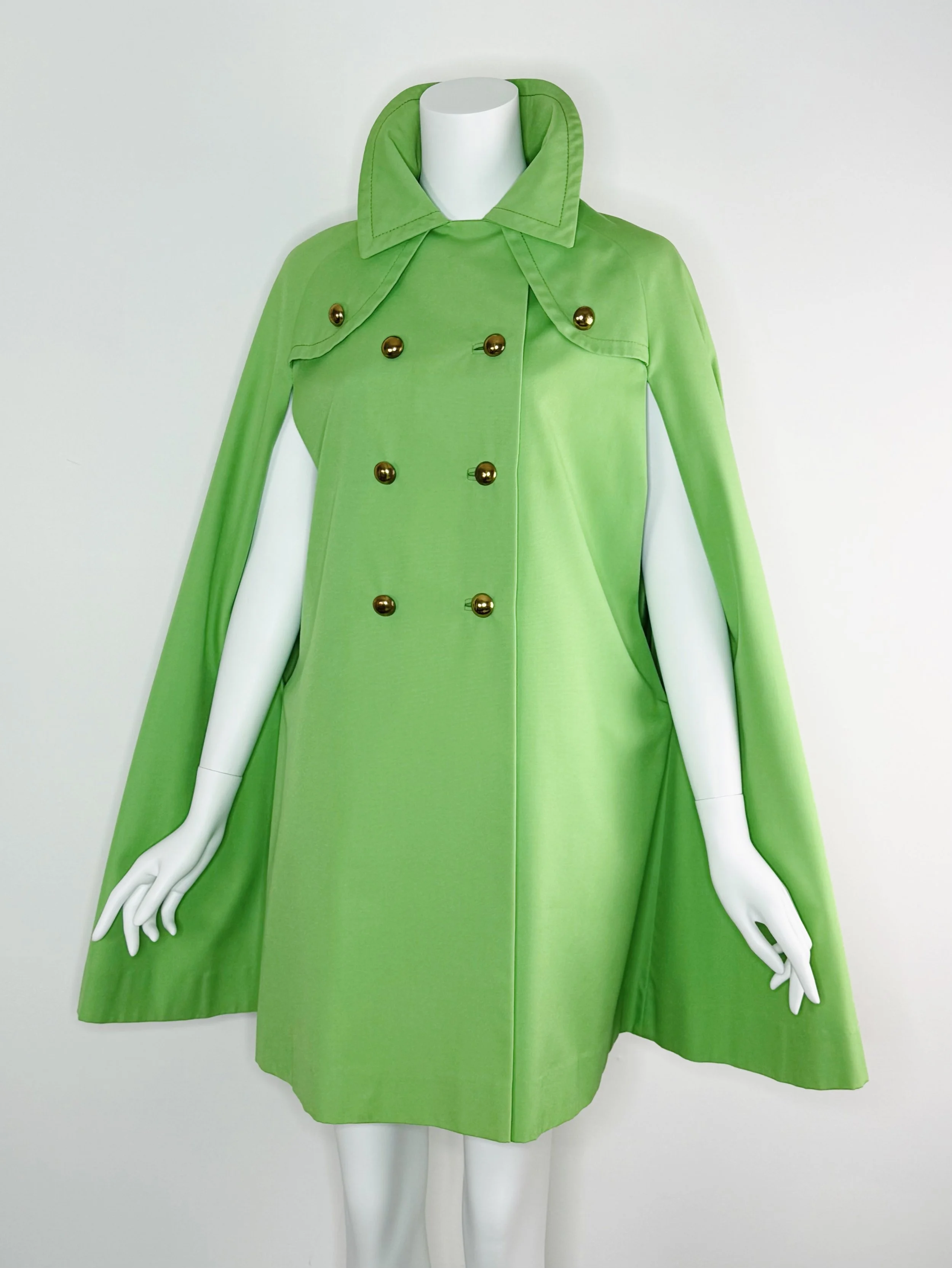 1960s mod green cape with gold buttons