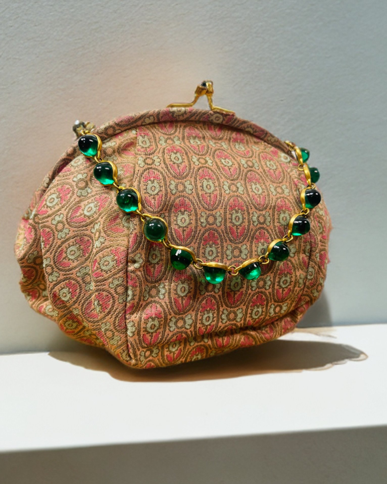 1950s evening bag with green cabochons