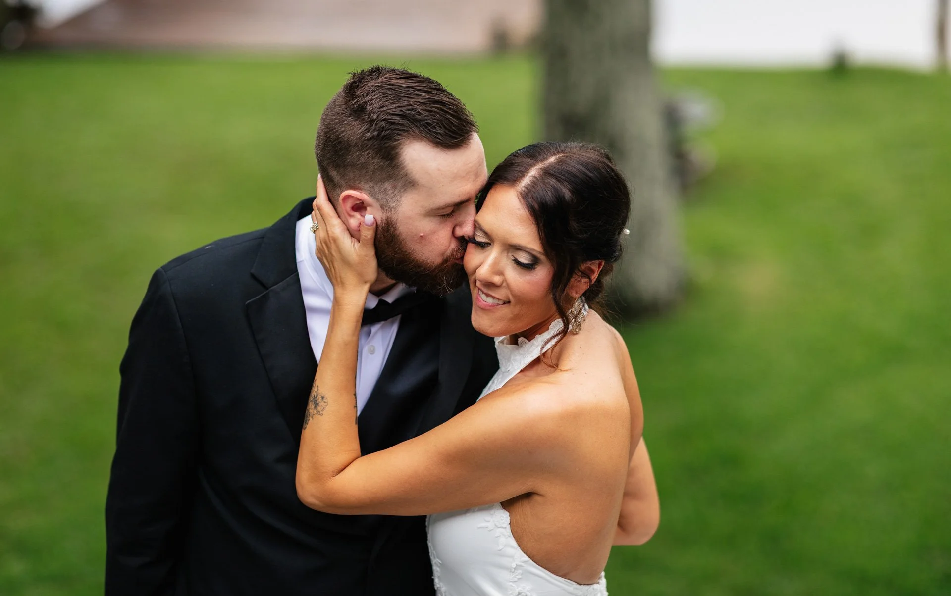 Bride-Groom-Kissing-Newlywed-Portrait.jpg