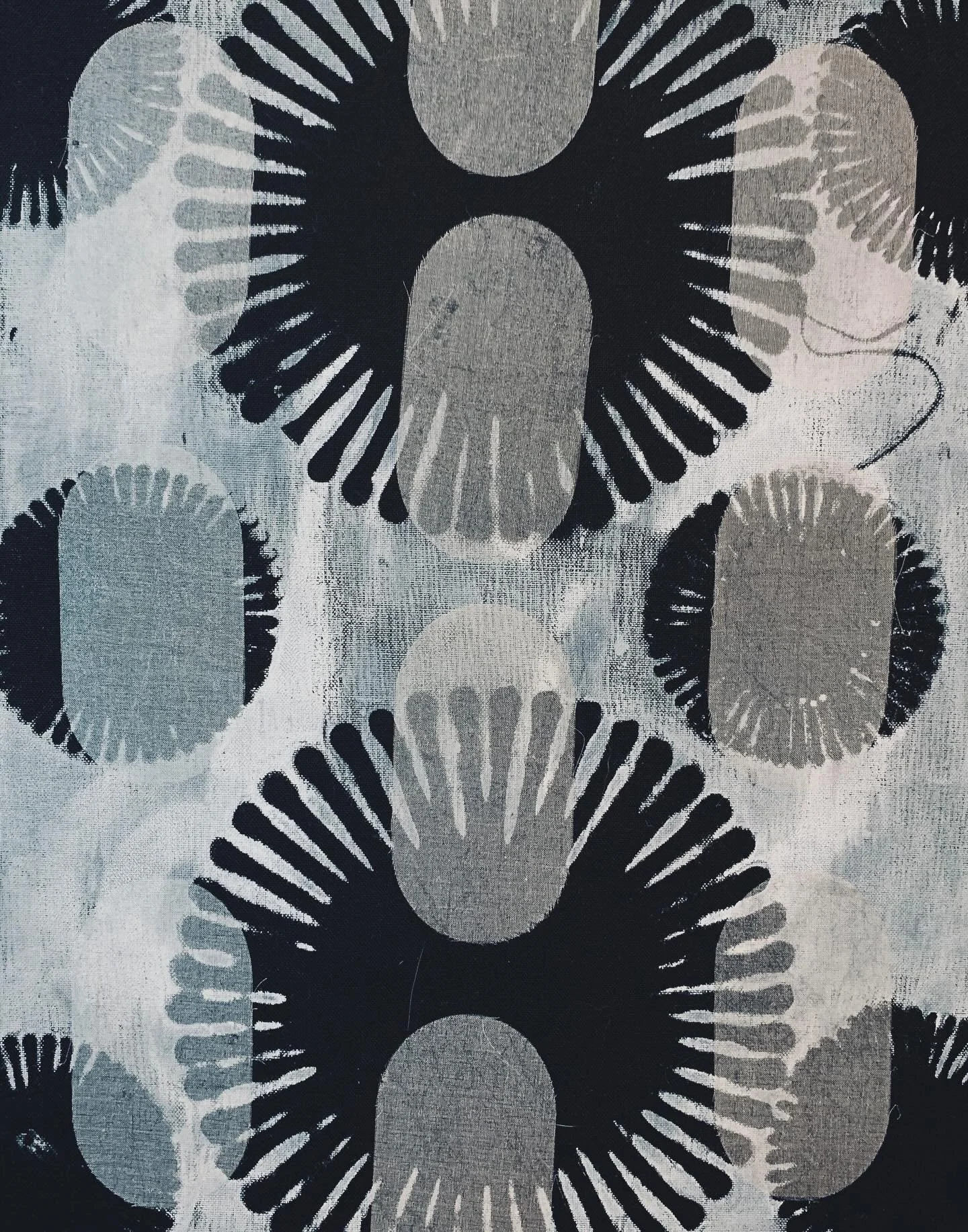 I am experimenting with using transparent fabric overlays over fabric monoprints. 8x10 #monprintedfabric #printingonfabric #designwithstencils #stencildesign #blackandwhite #fiberartistsofinstagram