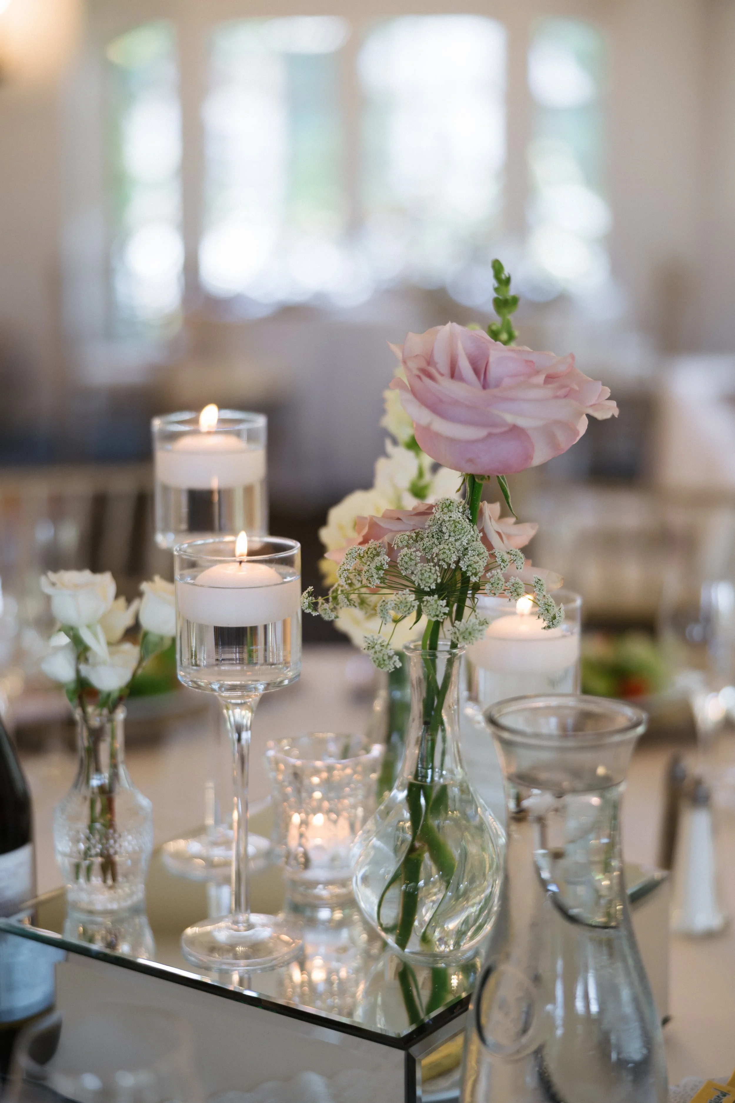 bud vases and candles