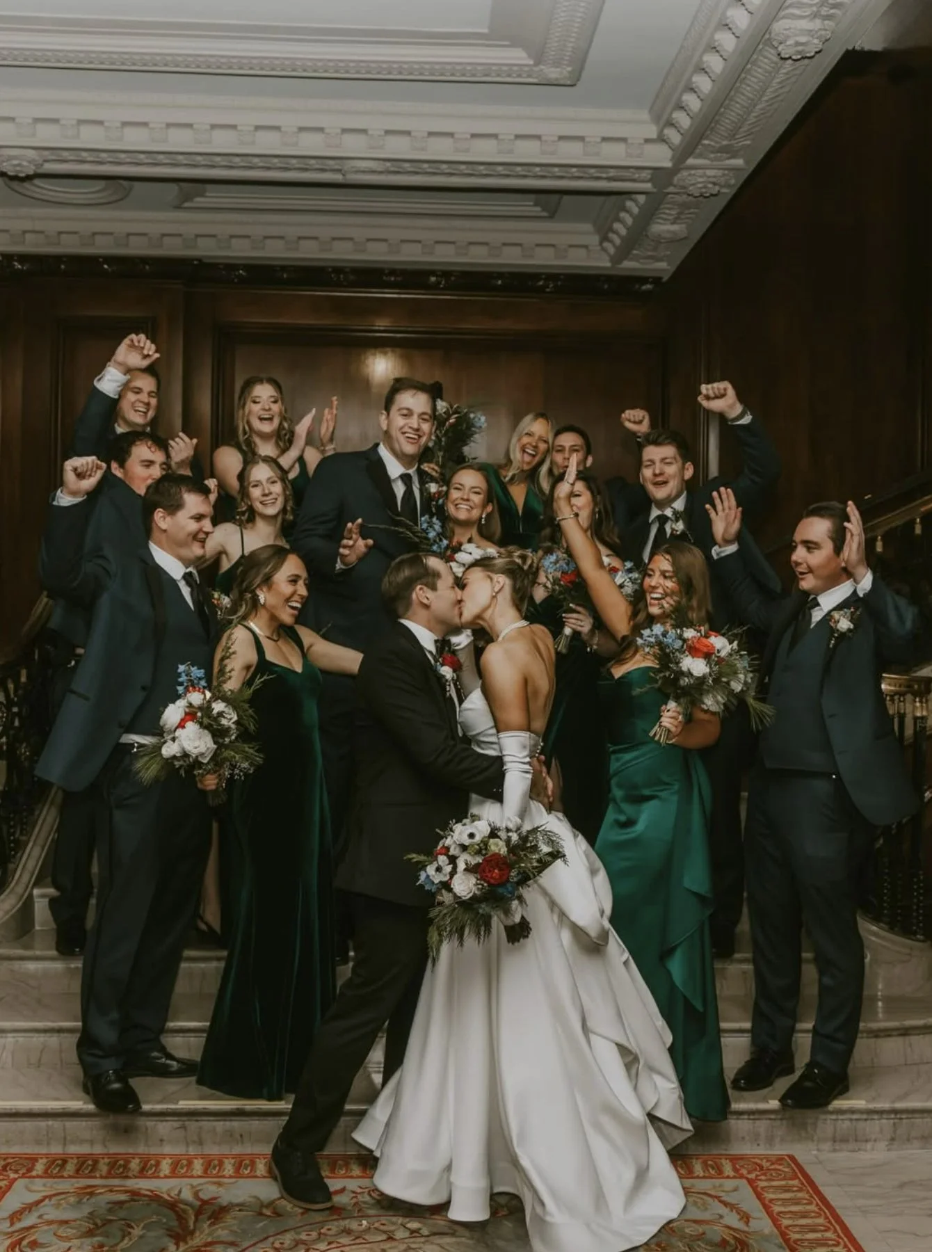 winter-inspired florals bring a festive elegance to the scene, beautifully capturing the joy, celebration, and timeless romance of their wedding day