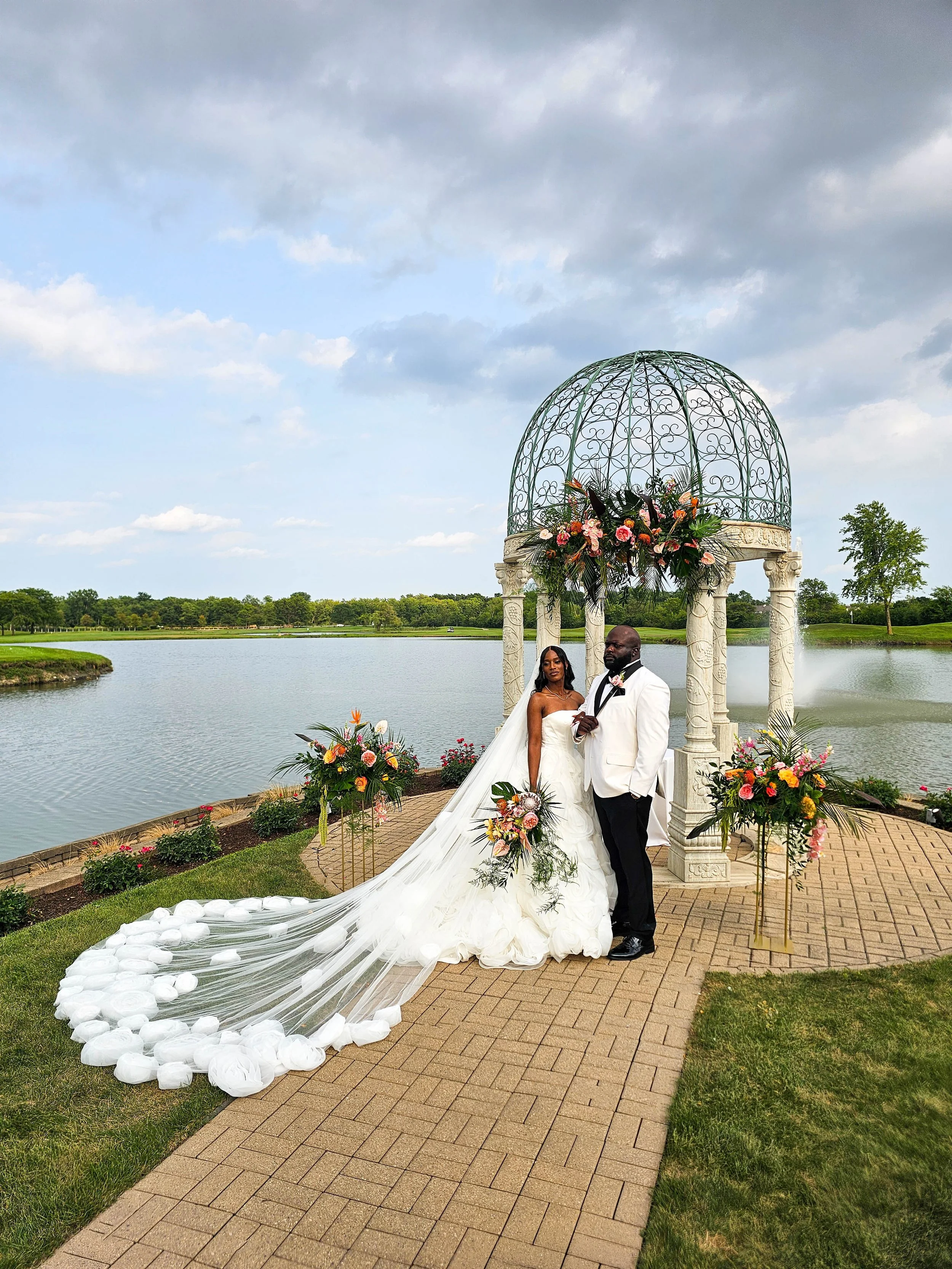 tropical ceremony arbor flowers