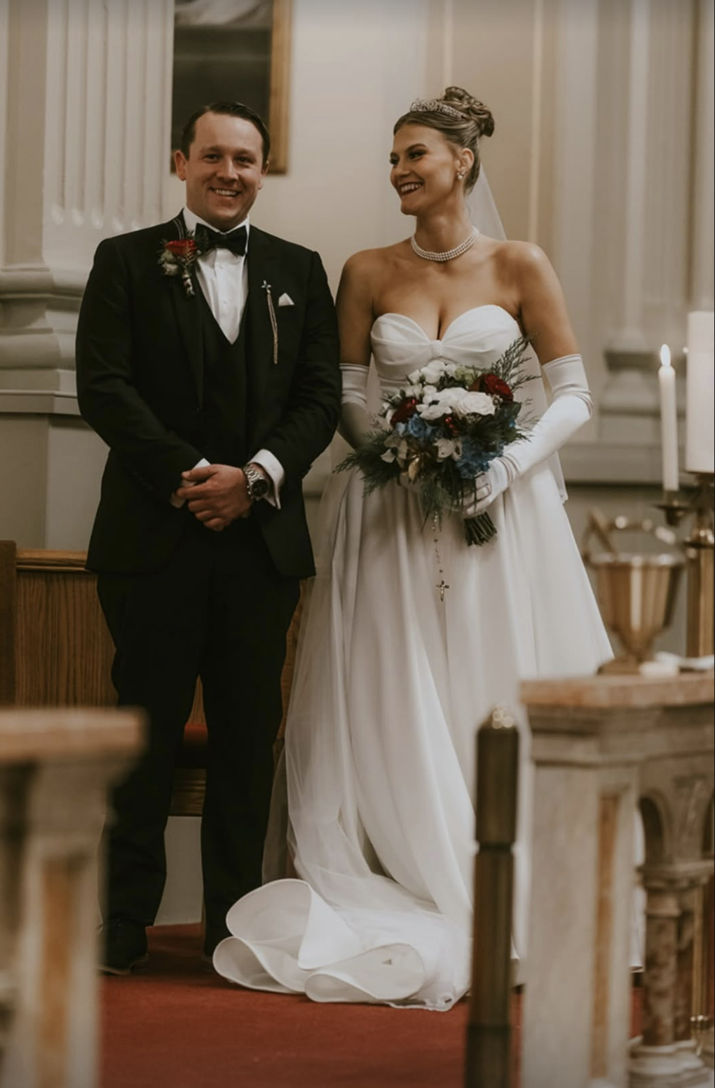 winter-inspired florals bring a festive elegance to the scene, beautifully capturing the joy, celebration, and timeless romance of their wedding day