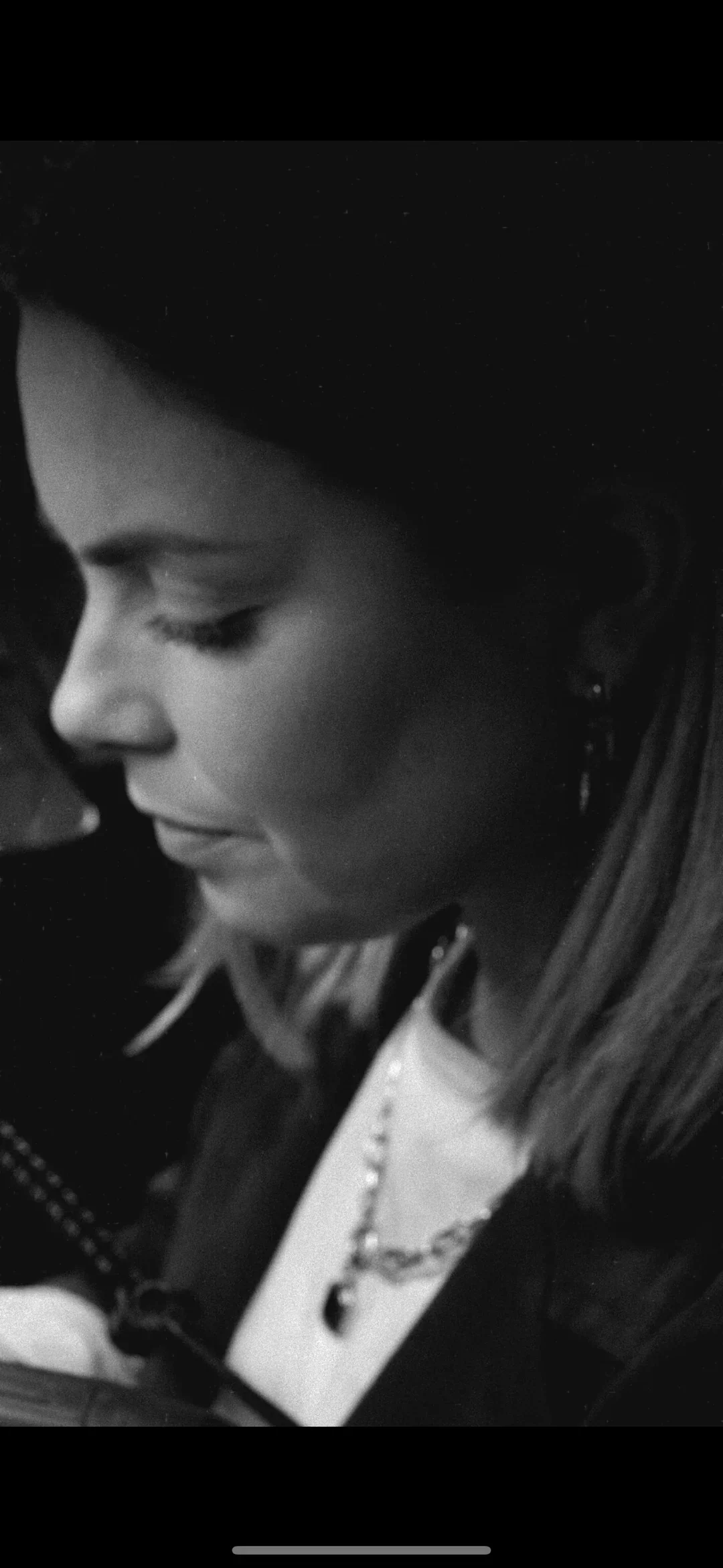 Liv_Thurlwell_inspecting_jewellery.webp