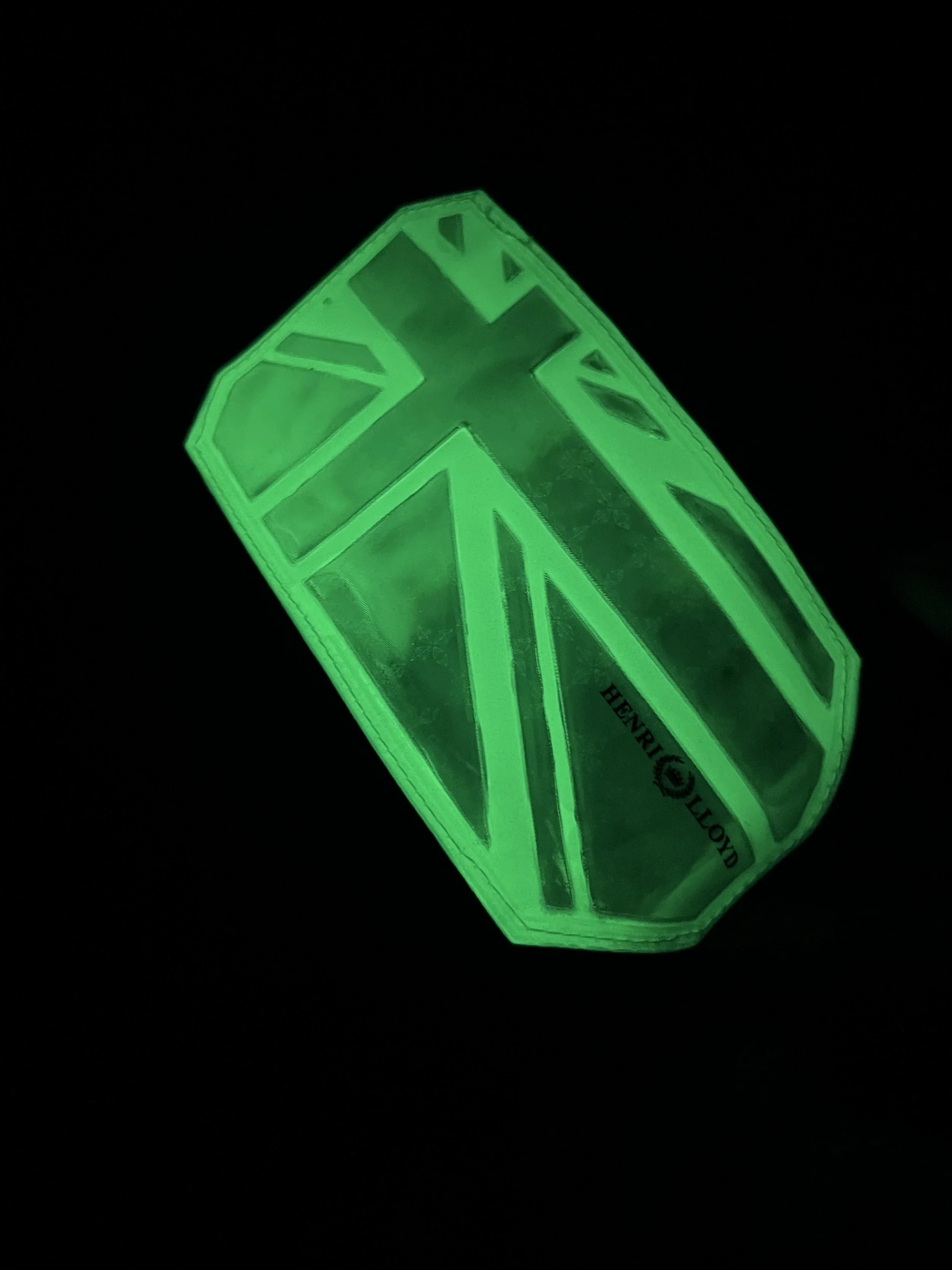 Reflector patch on the Ocean Pro jacket hood illuminated by night