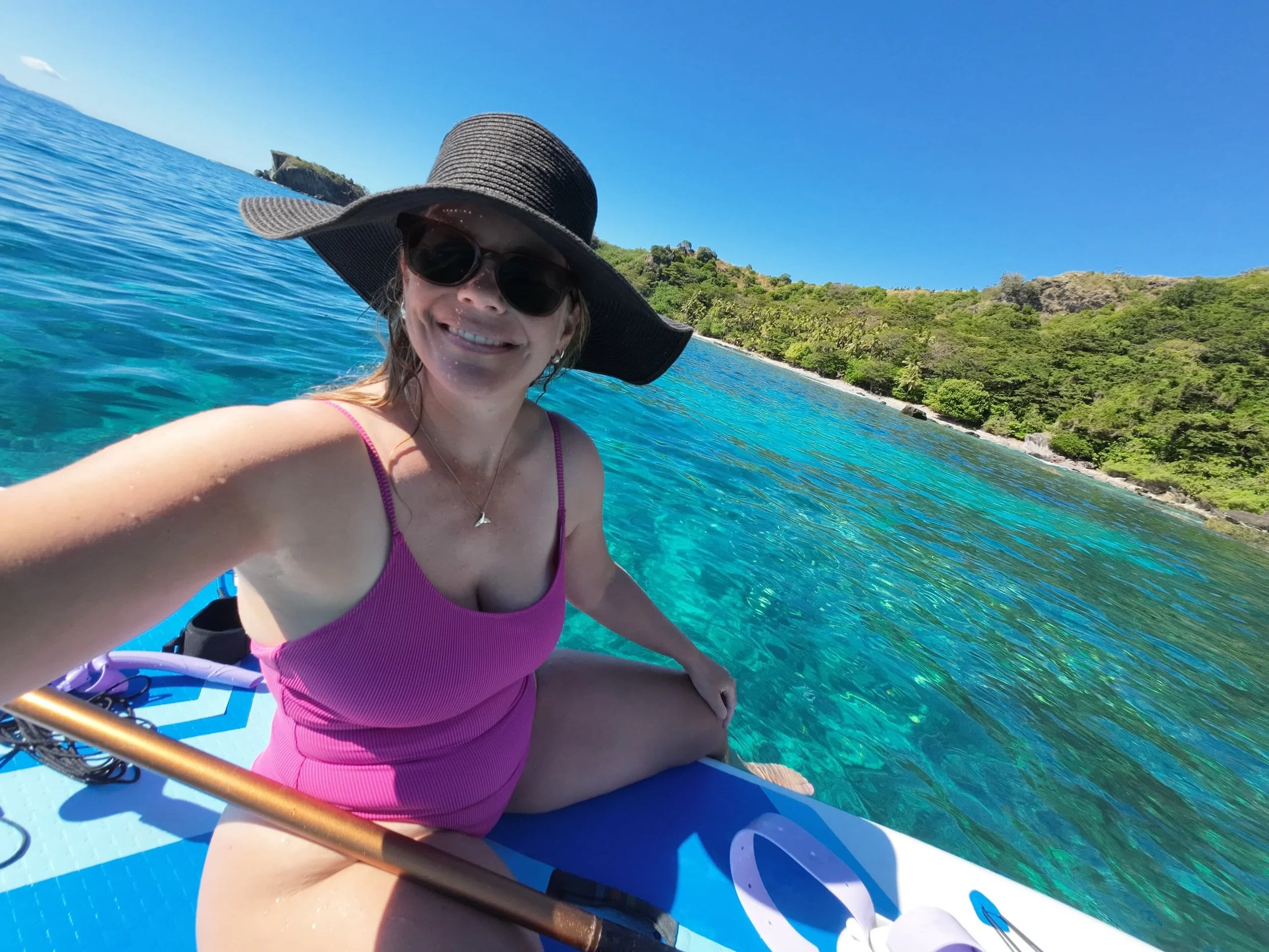 Tara Cooney (Editor) relaxing on a paddleboard