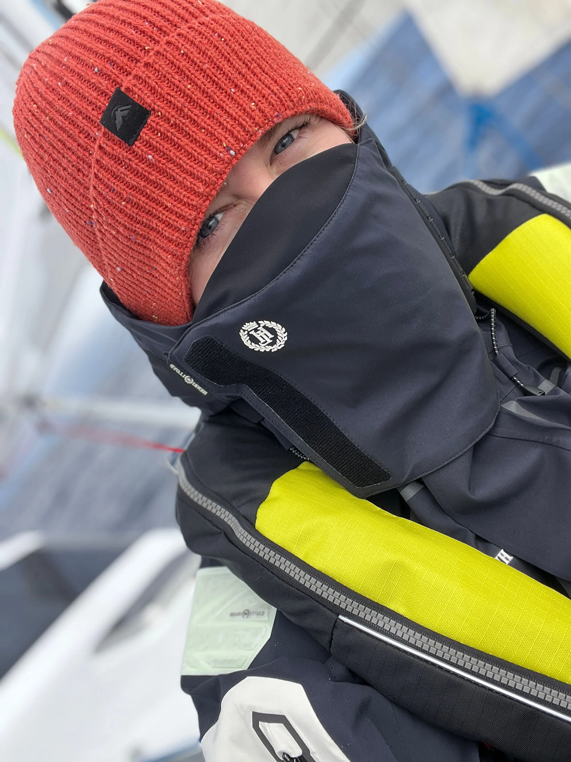 Saltwater Journal Editor Tara Cooney wears Henri-Lloyd Ocean Pro wet weather gear sailing offshore