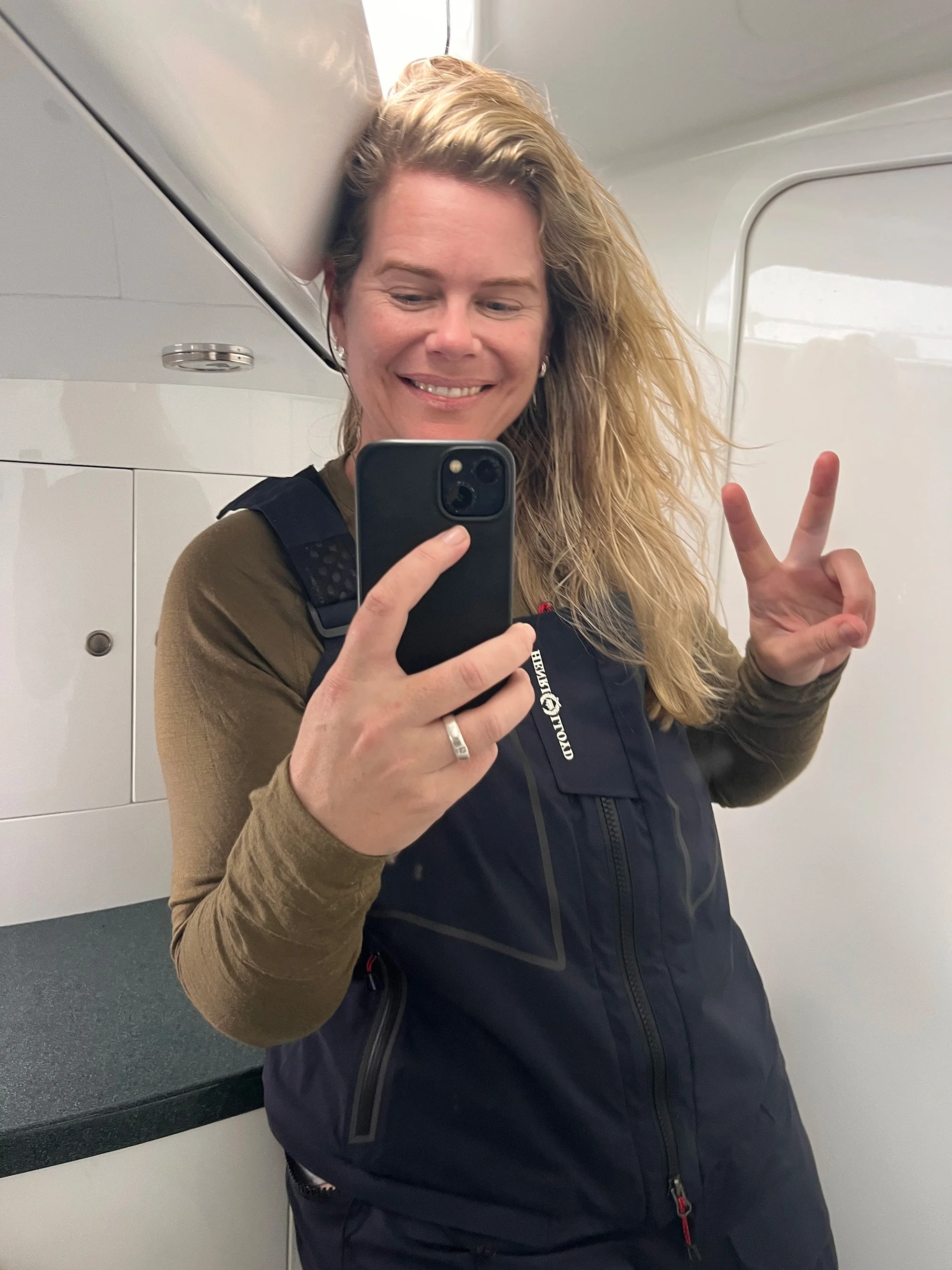 Tara Cooney testing the salopettes in the head during rough sea