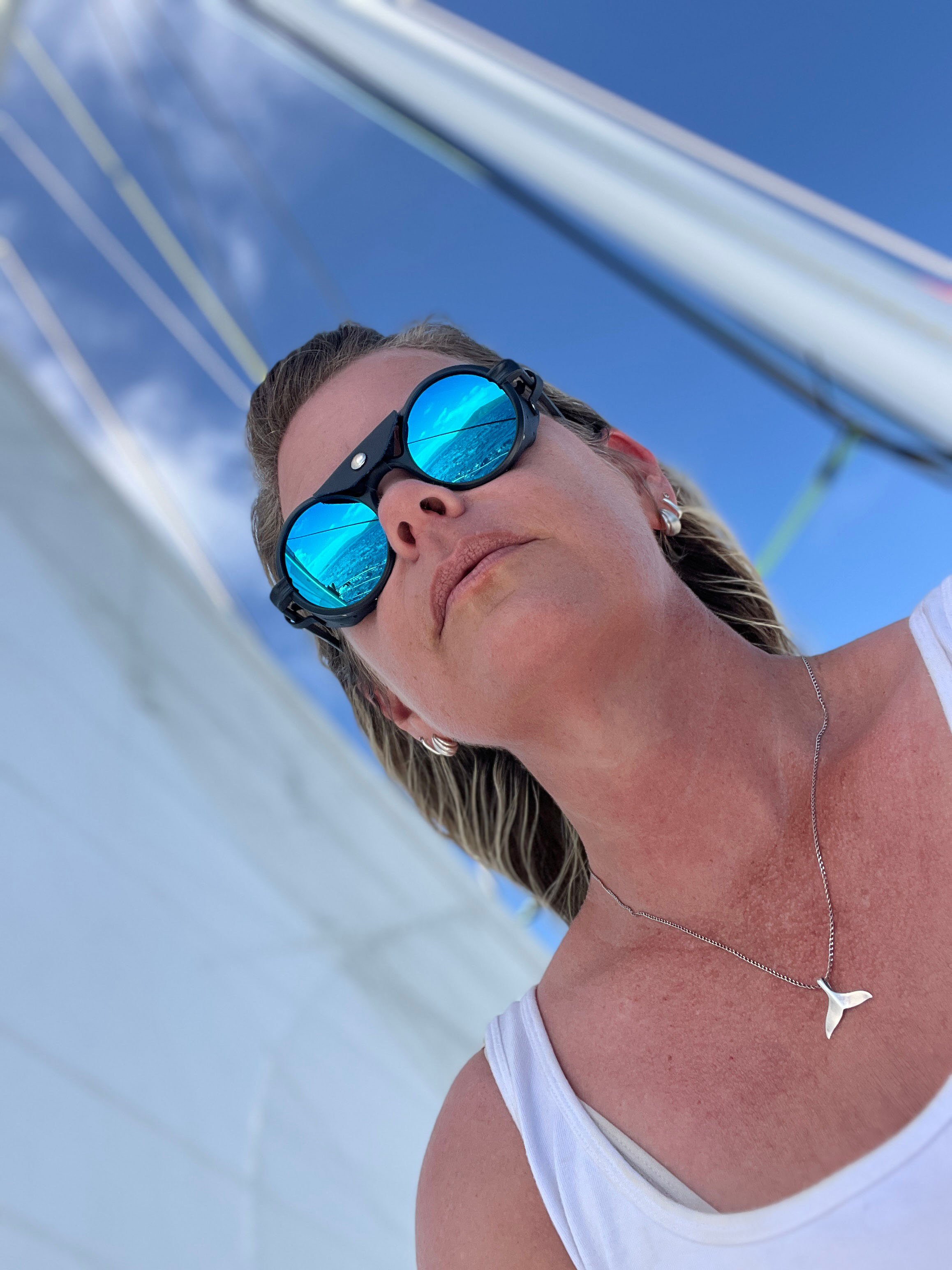 Tara Cooney, Editor Saltwater Journal wears Valon Heron sunglasses while sailing