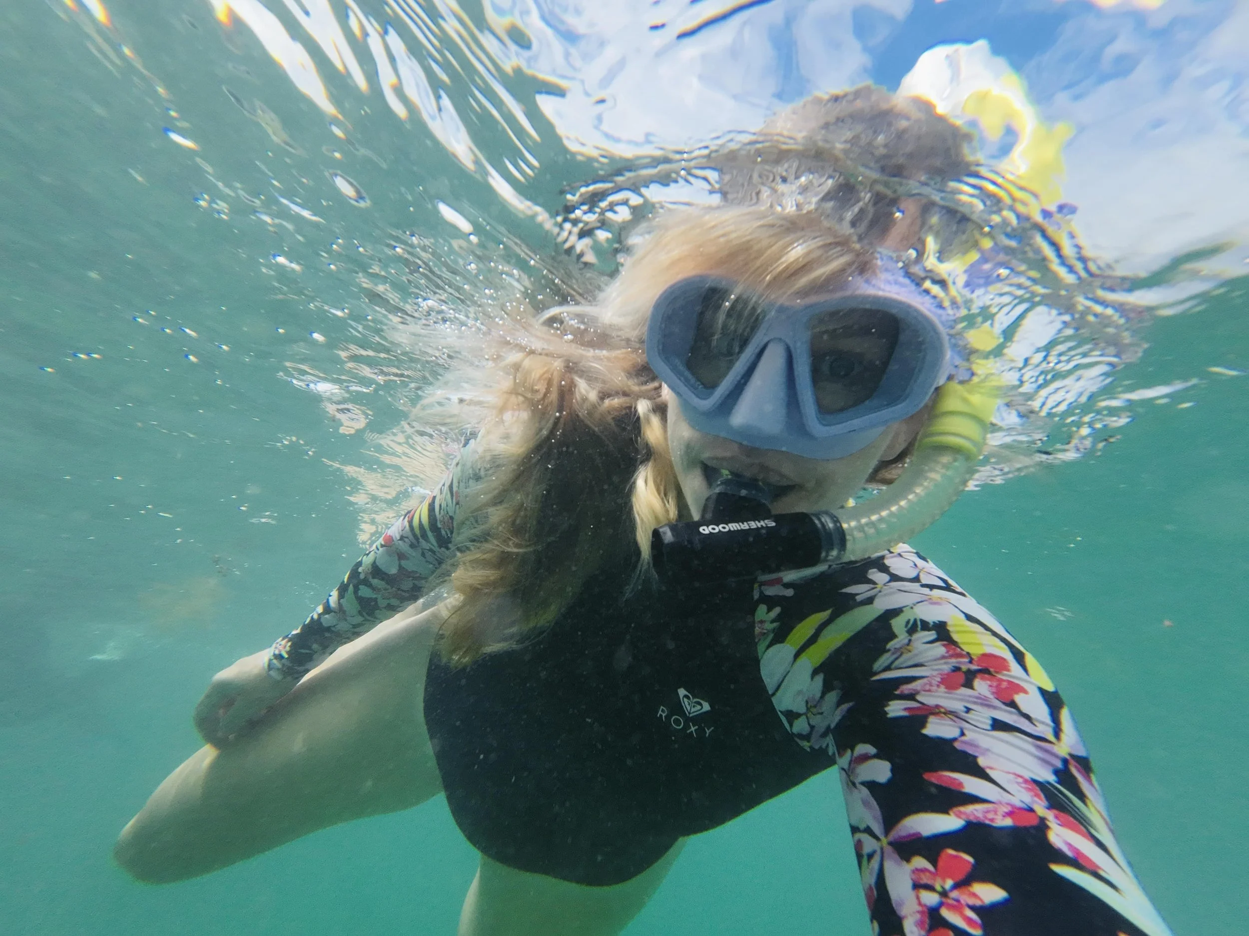 Editor Tara snorkelling in the ocean