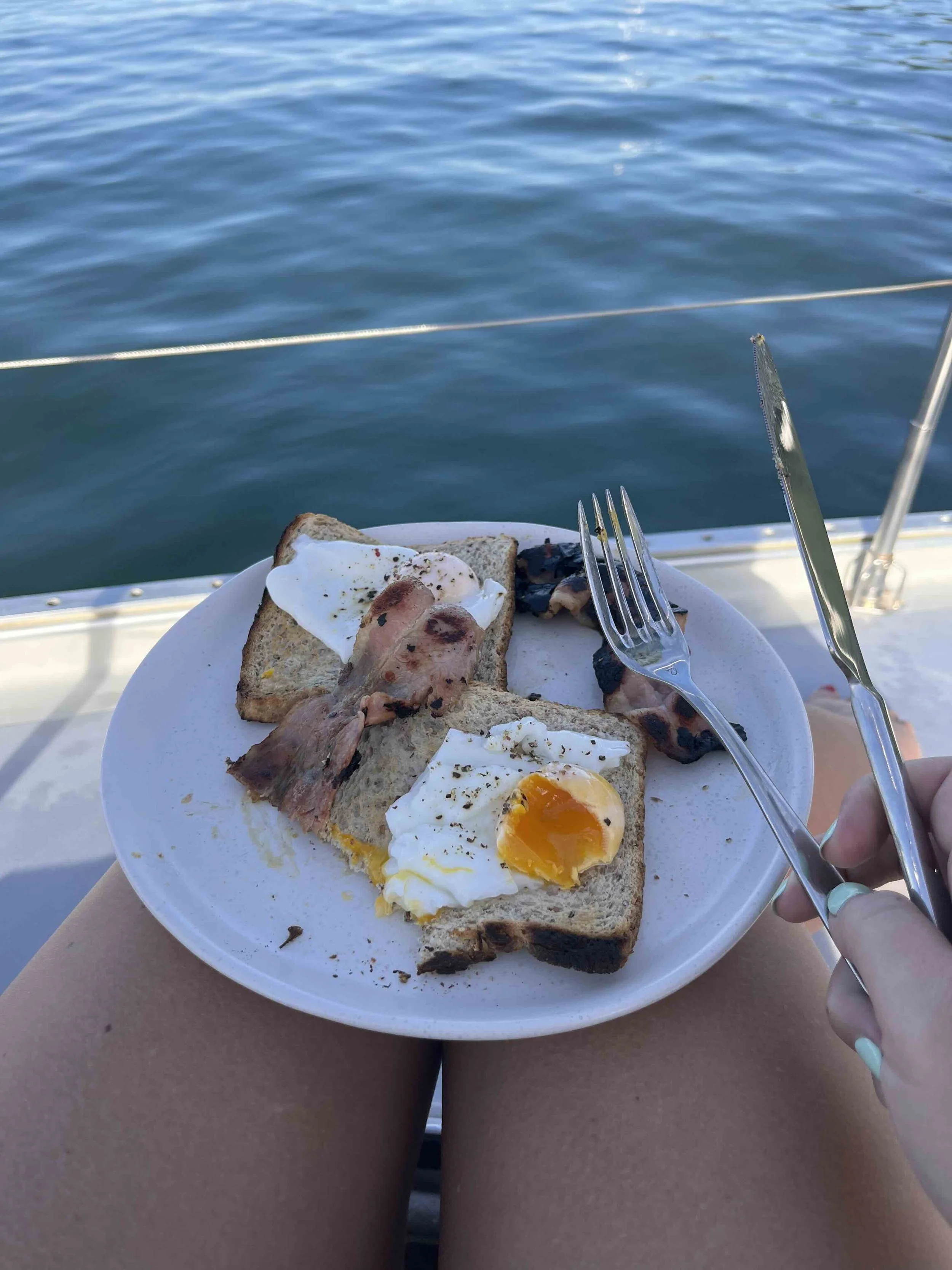 Bacon and egg breakfast on the ocean