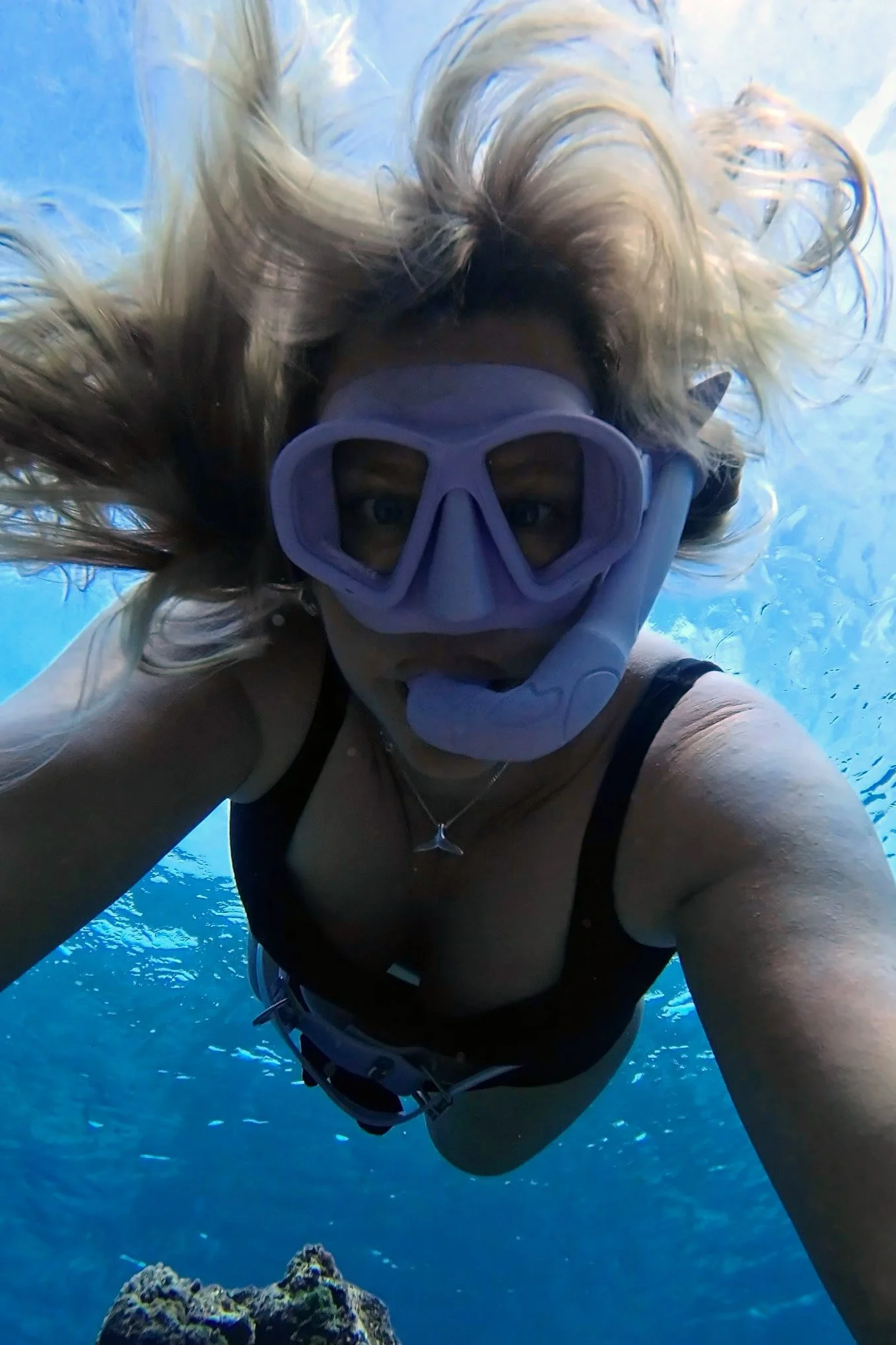 Tara Cooney - Editor Saltwater Journal snorkelling underwater in Fiji