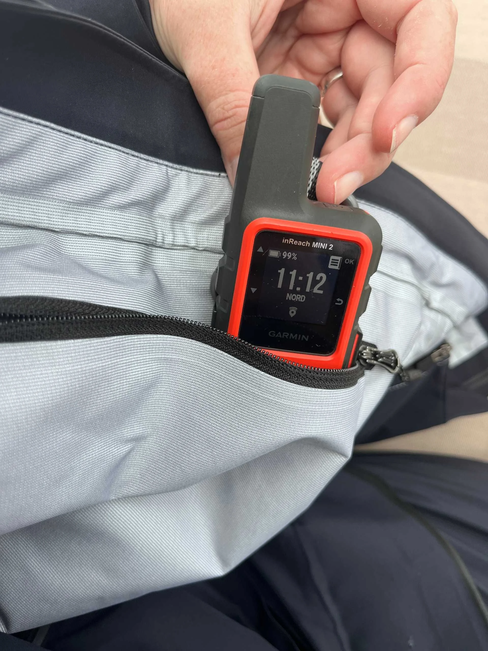 Inside pocket keeps a Garmin inReach dry and protected in the Ocean Pro jacket