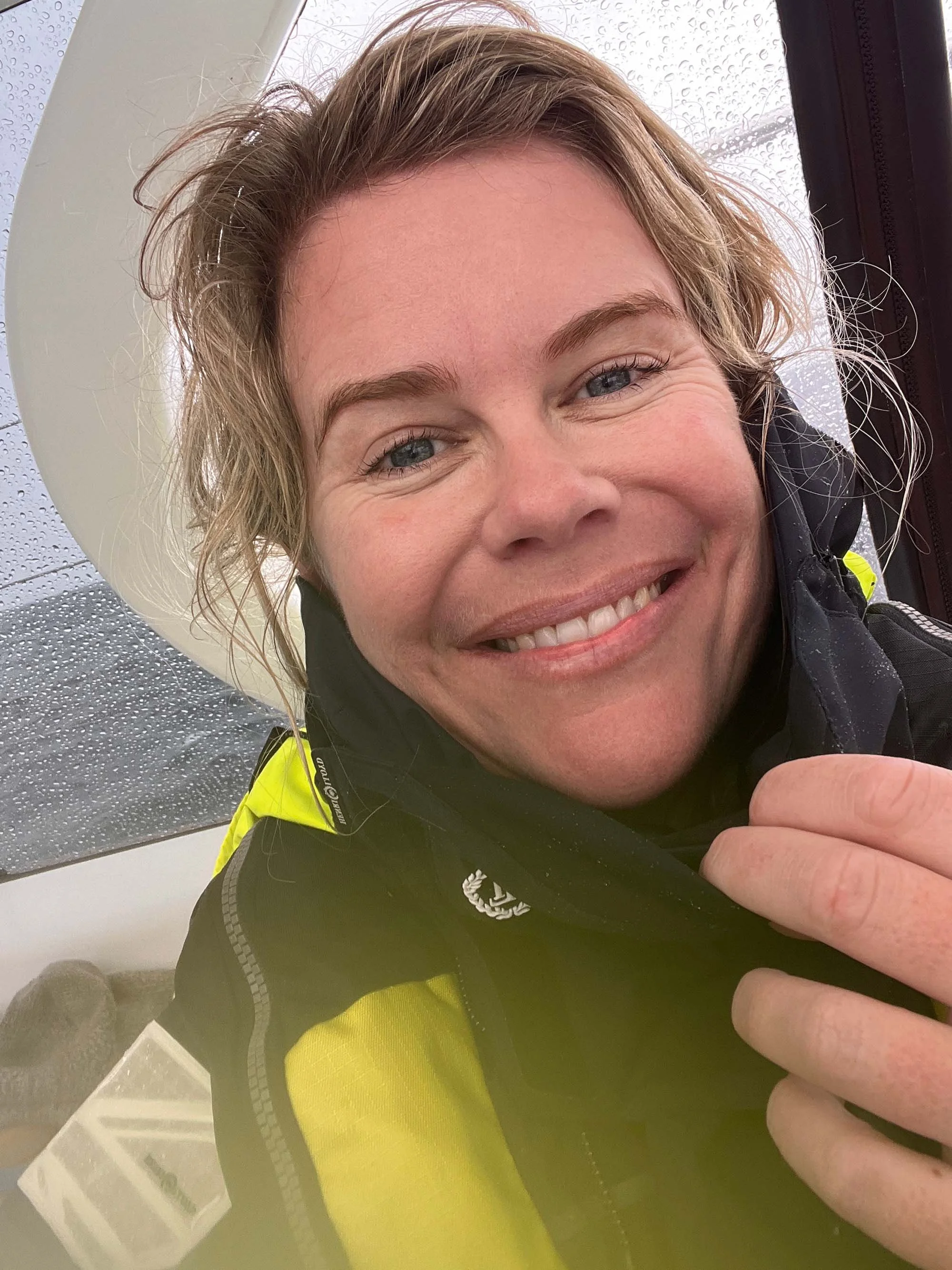 Tara Cooney testing the Ocean Pro - still dry after a wet on deck squall