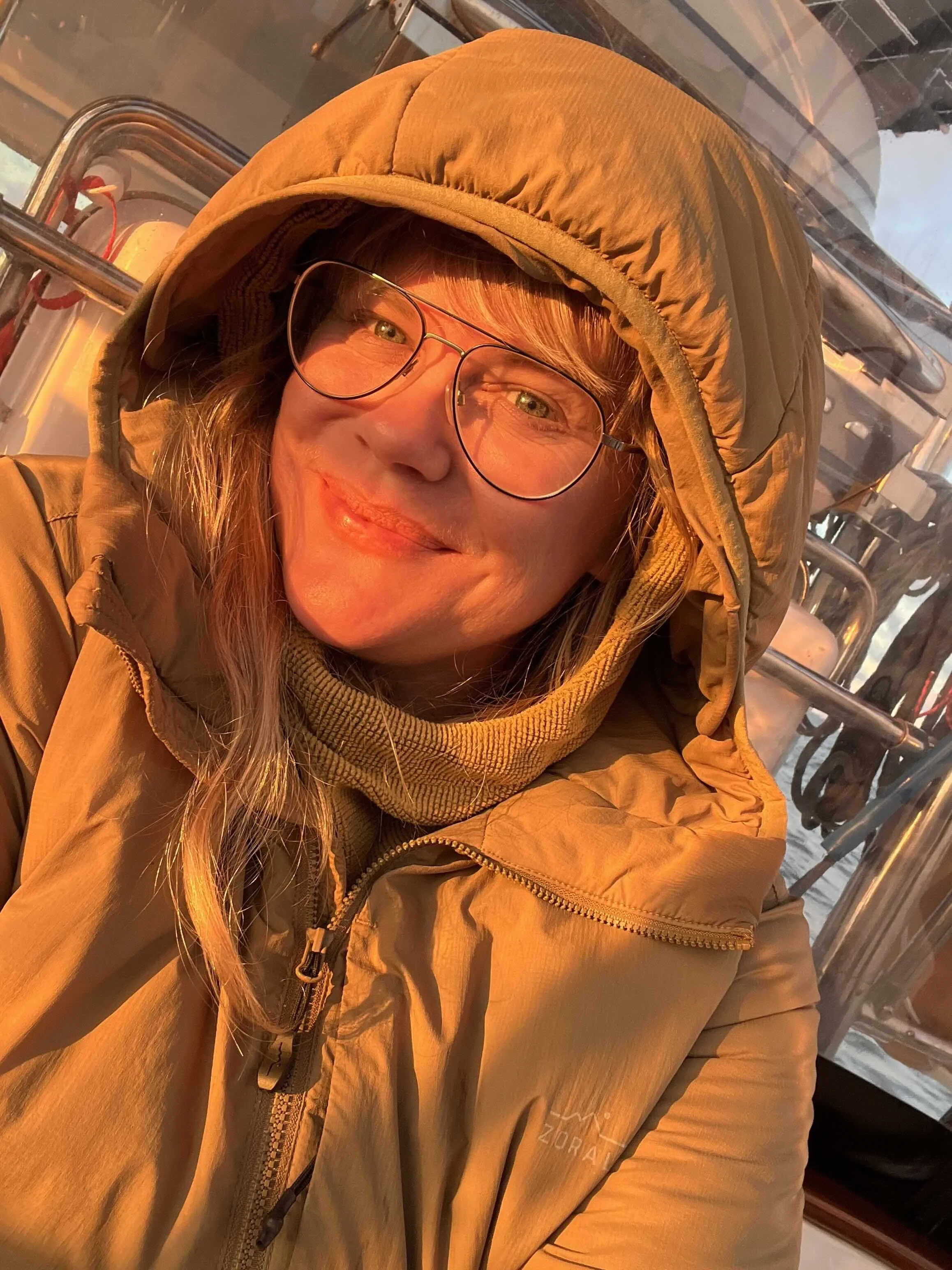 Tara Cooney wears cosy Zorali layers onboard sailing
