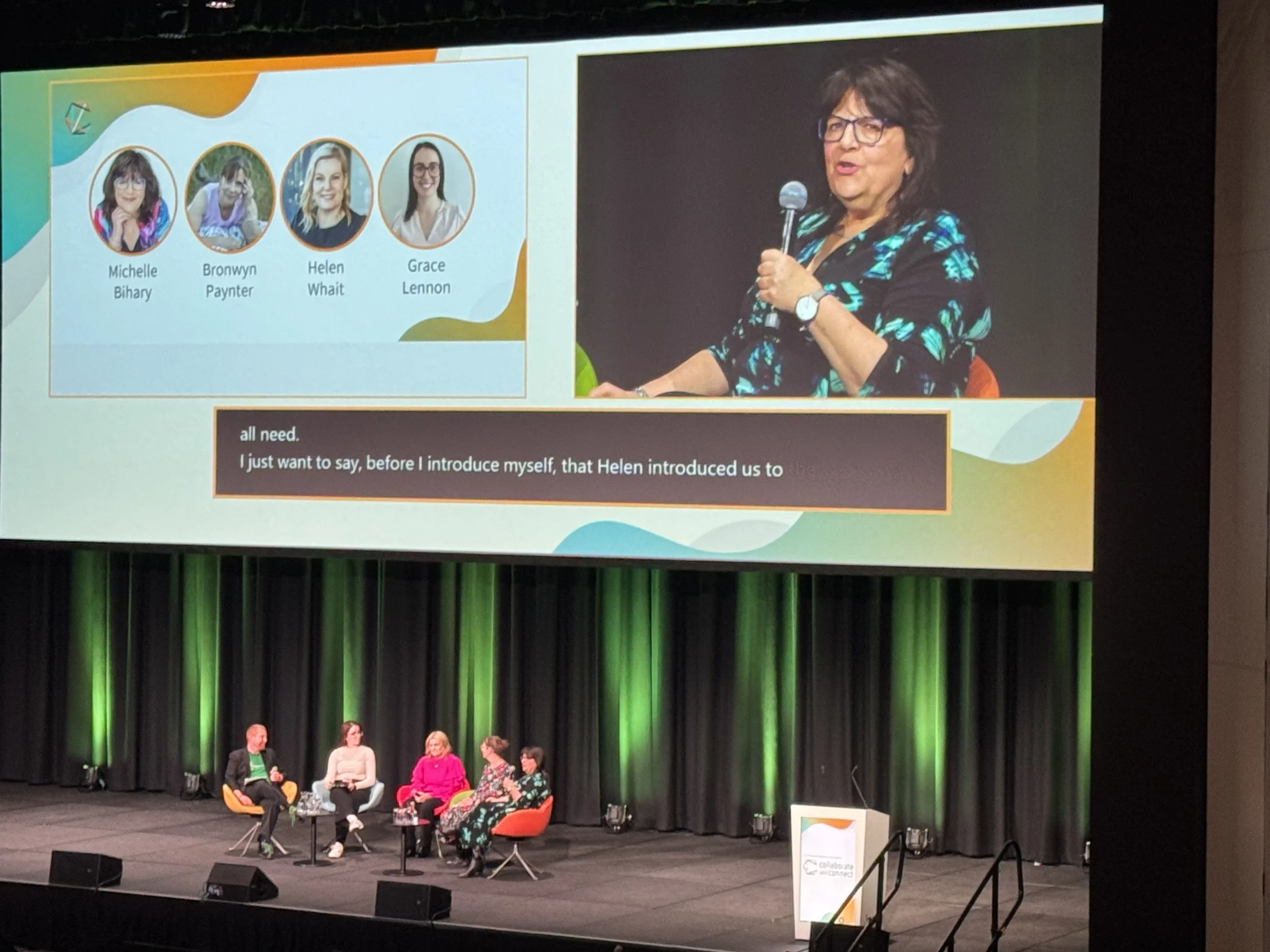 Michelle Bihary on screen and speaking on panel