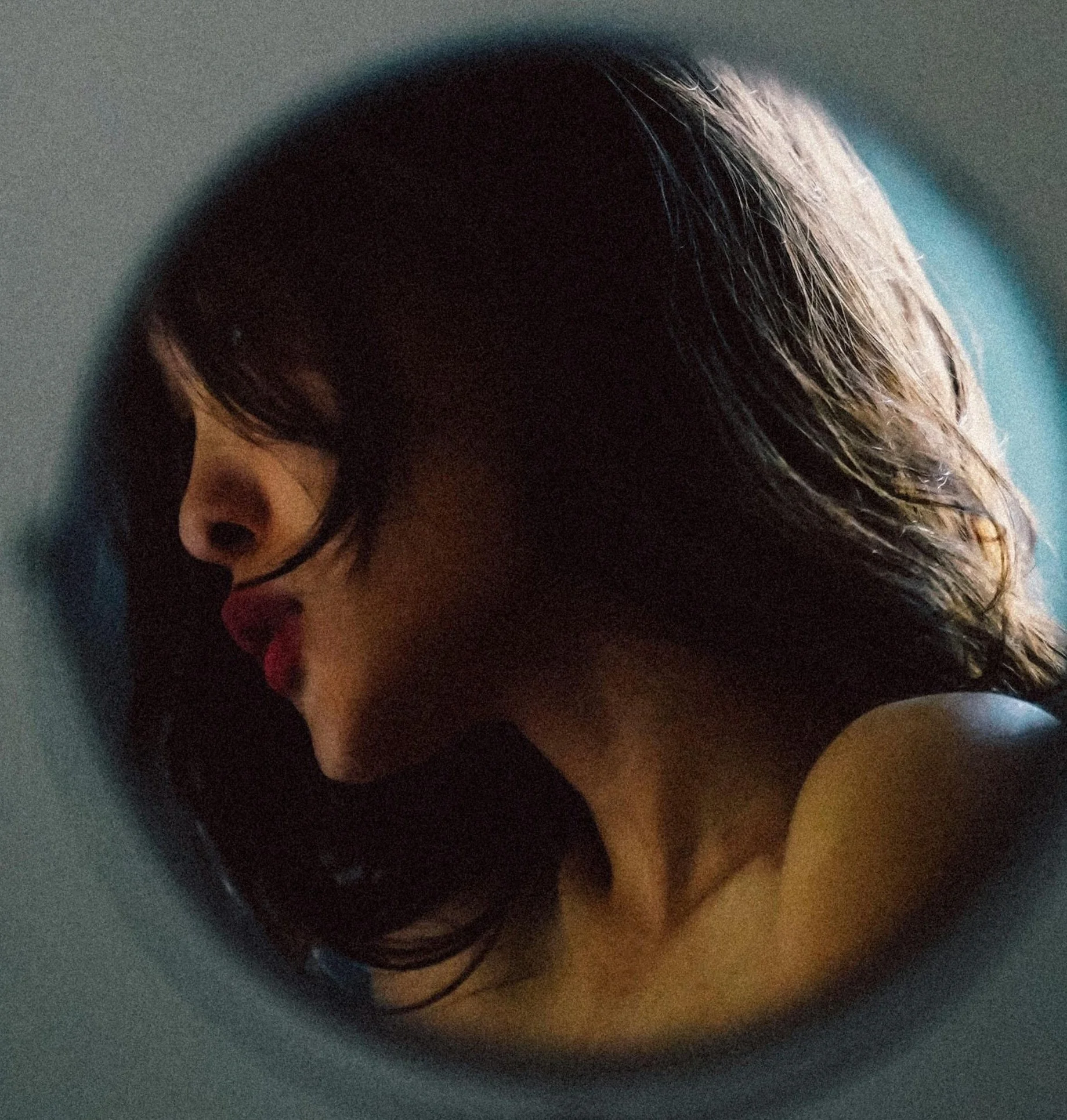 side profile of woman in mirror