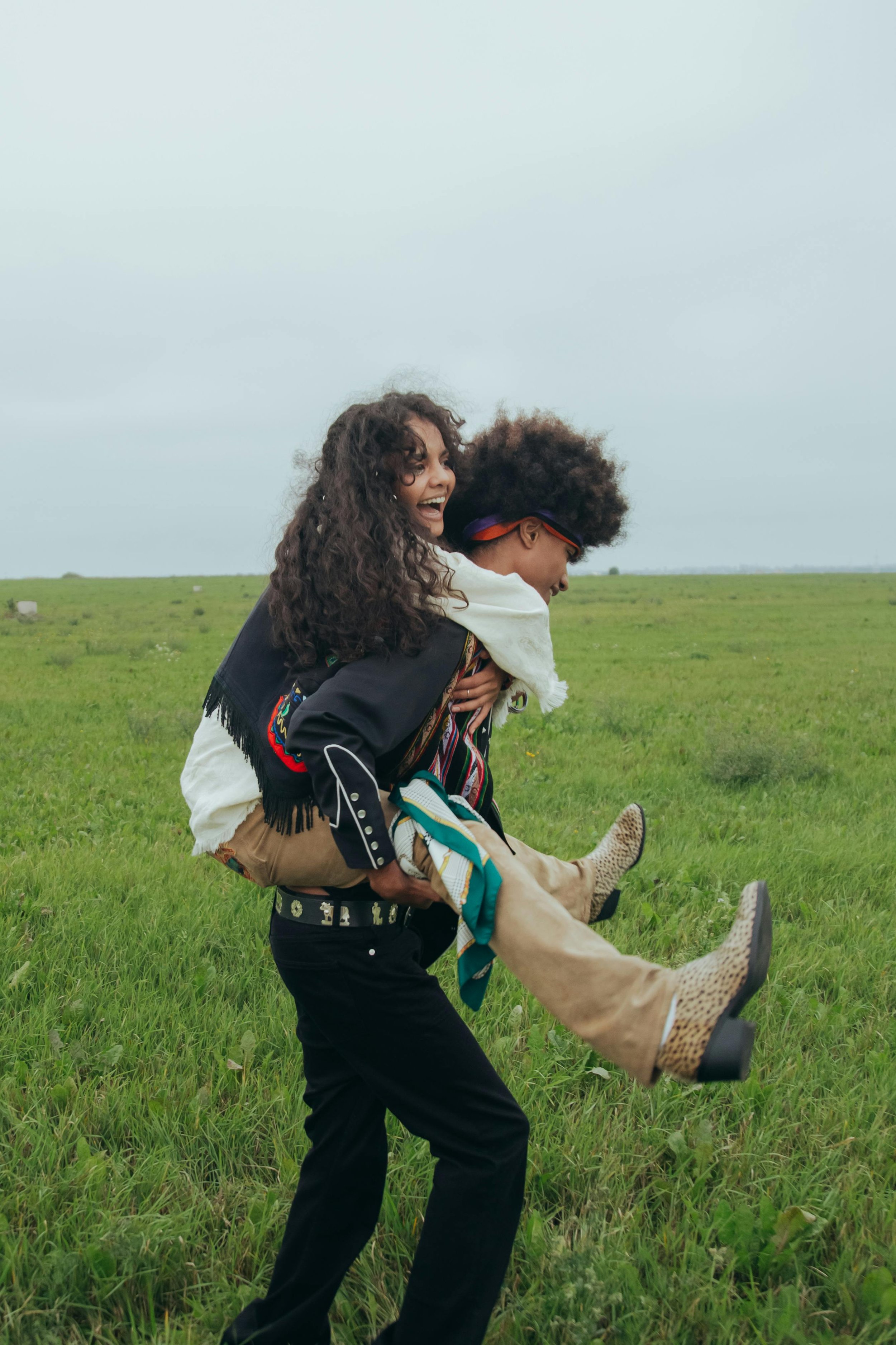 young couple in grass field