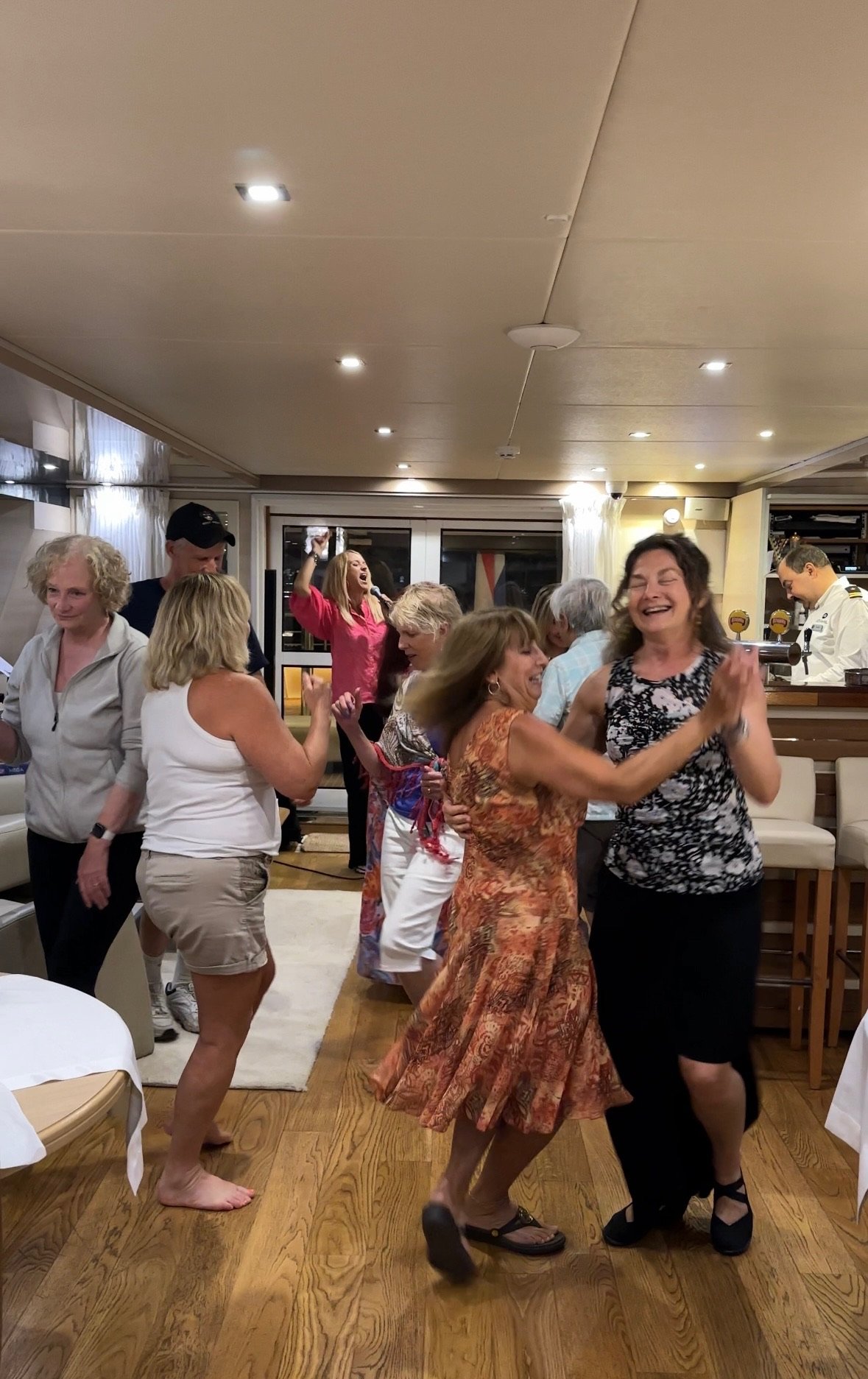 Passengers on a yacht dancing.jpg